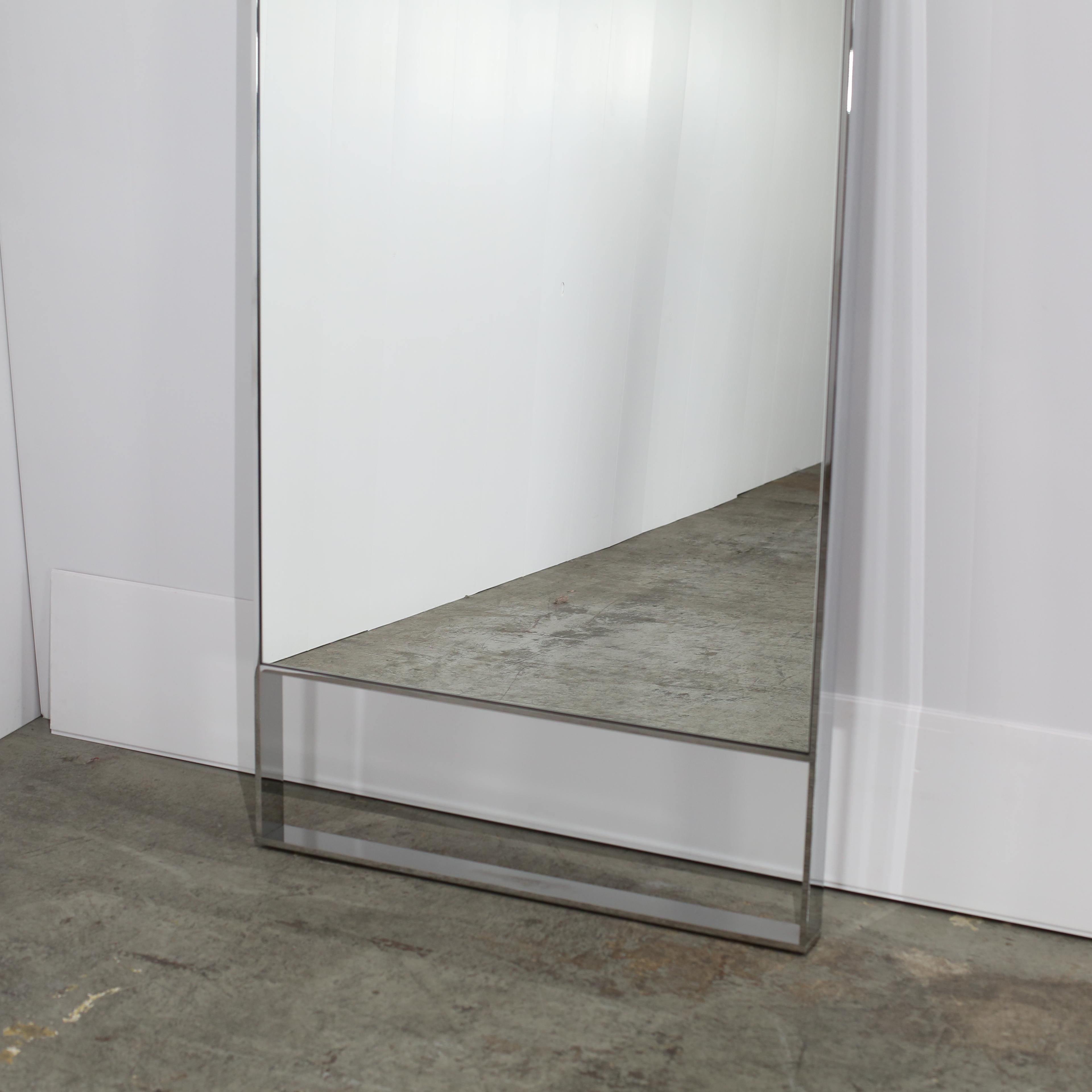 Add a touch of elegance and sophistication to your living space with the Psiche Wall Mirror by Maxalto. Crafted with high quality materials, this mirror boasts a sleek and modern design that will elevate any room. Its large size and reflective