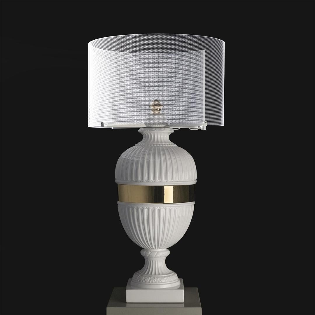 Inspired by the Classical urns from the frescoes in the Hall of Cupid and Psyche in Mantova’s Palazzo Te, this table lamp will Stand out in any kind of décor, with its Fine ceramic and timelessly elegant shape. The innovative touch technology is