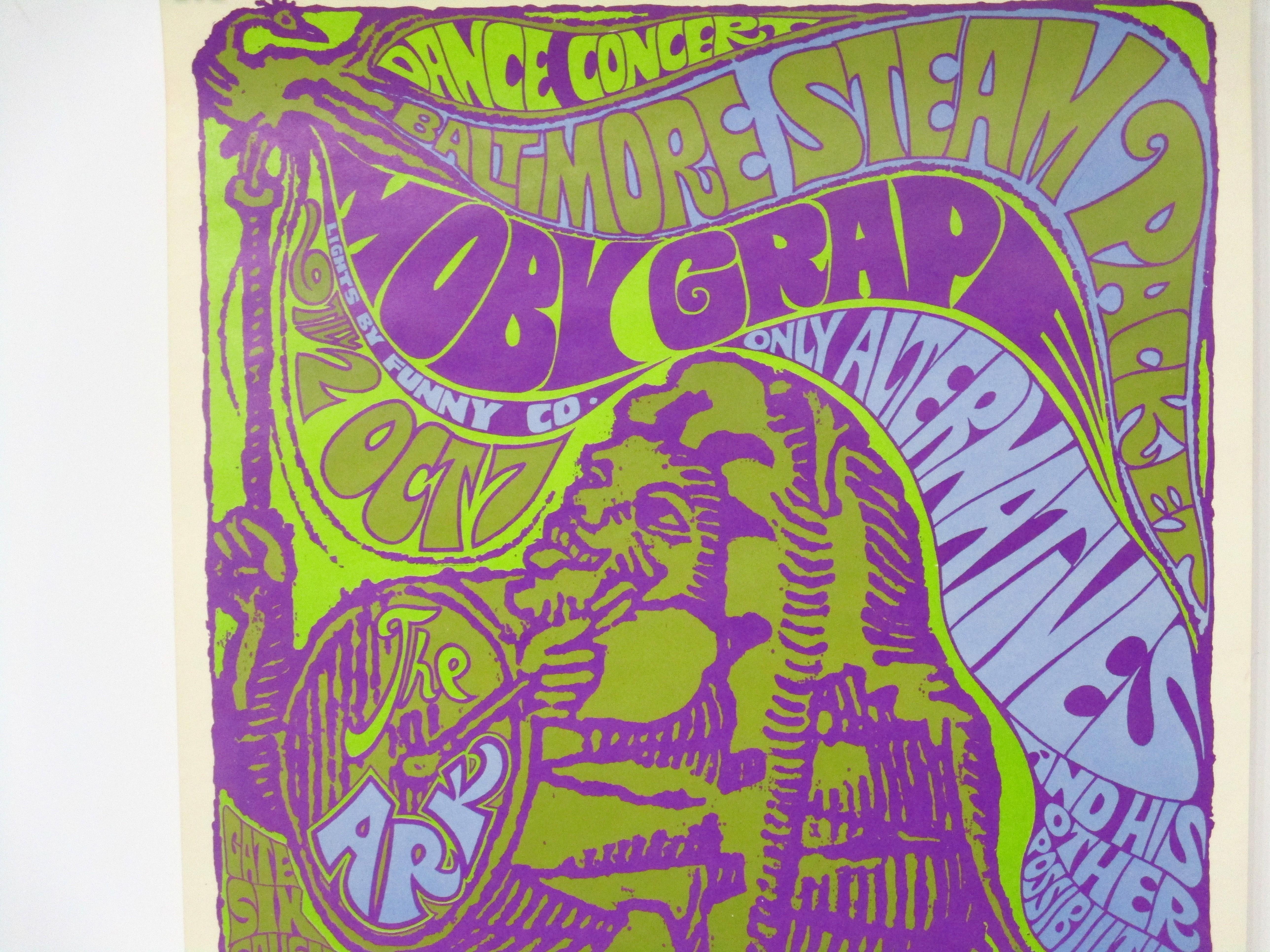 A wild vintage psychedelic rock show poster with a creature banging on a drum advertising a dance concert at the Ark . The bands playing at the event include Baltimore Steam Packet, Moby Grape and Only Alternaives with light show by Funny company .