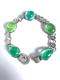 PT/950 Platinum Bracelet with 4 Paraiba 53.02c and 1 Tourmaline Cab. 13.08c.