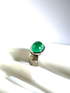 PT/950 Platinum Ring with 1 Paraiba Tourmaline Cabouchon 10.54cts.