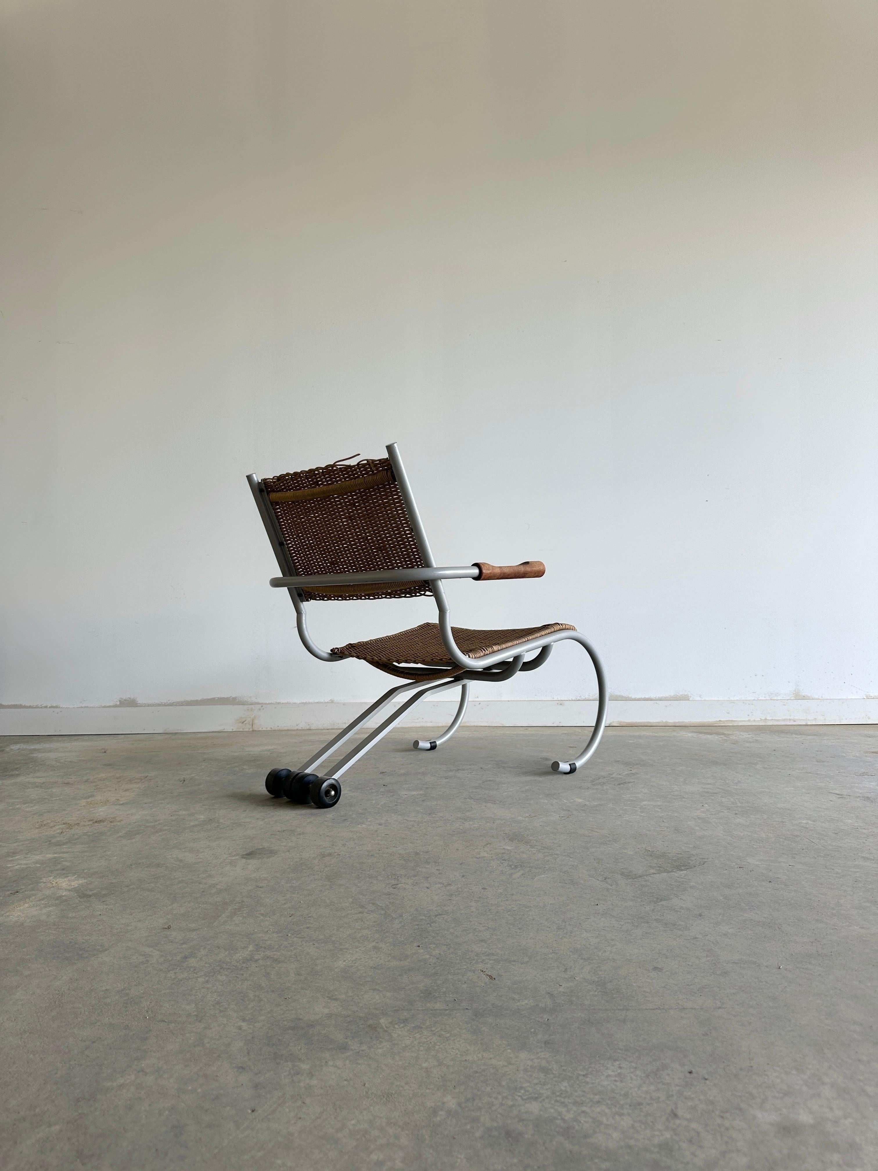 Swiss PT Skate wicker rolling lounge chair by Paul Tuttle for Strässle For Sale