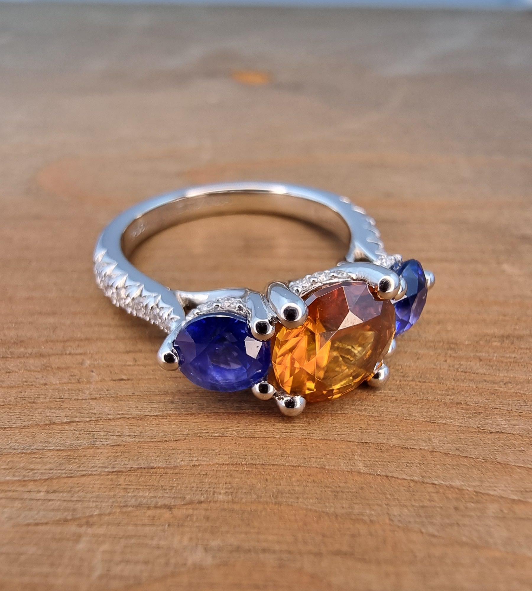 Women's PT950 Ring with Natural White Diamonds, Natural Orange Zircon and Two Sapphires For Sale