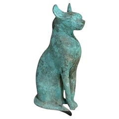 Escultura egipcia de bronce de un gato tolemaico
