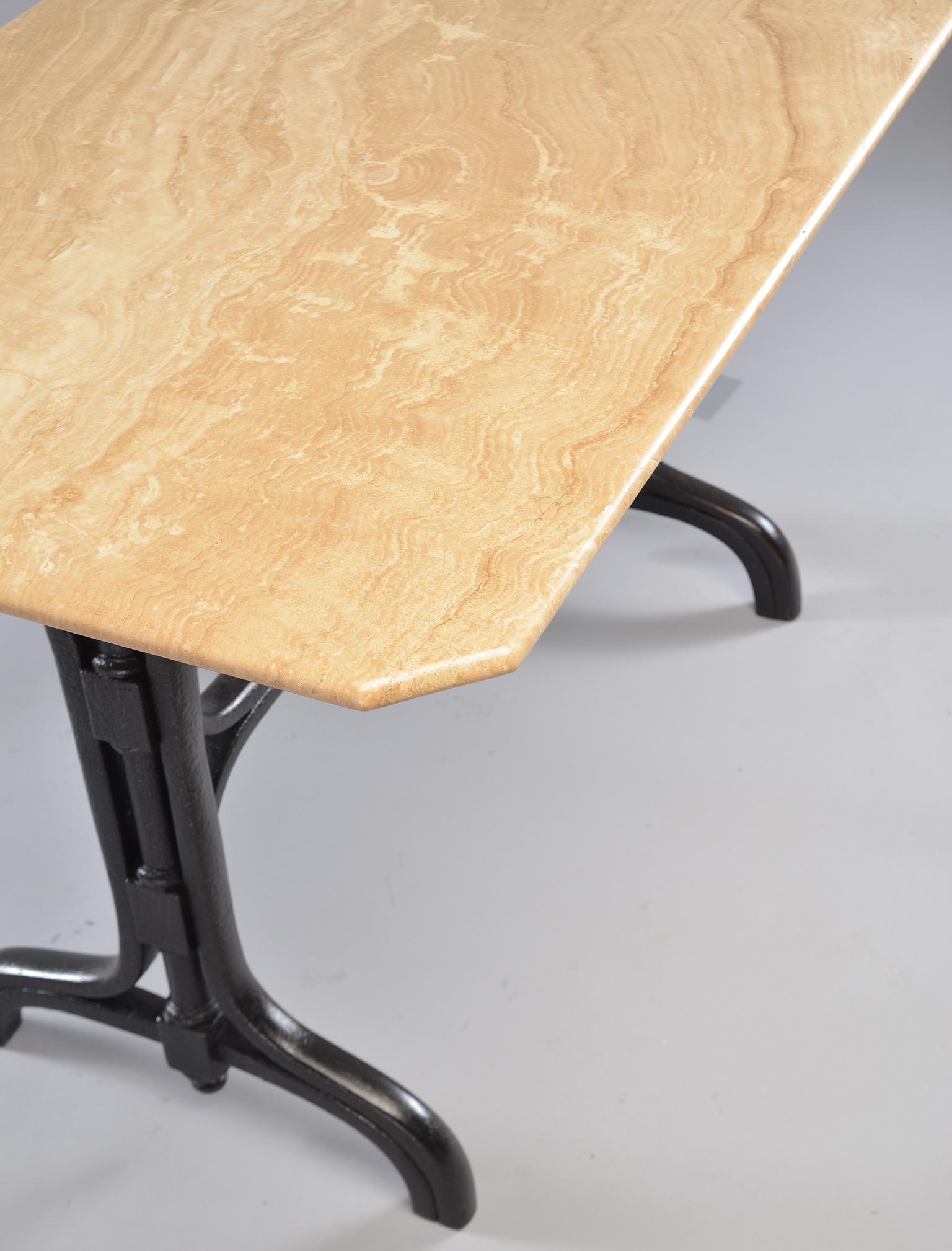 Versatile sized pub table has creamy beige marble top sits on a circa 1930s bentwood base with an ebonised finish.