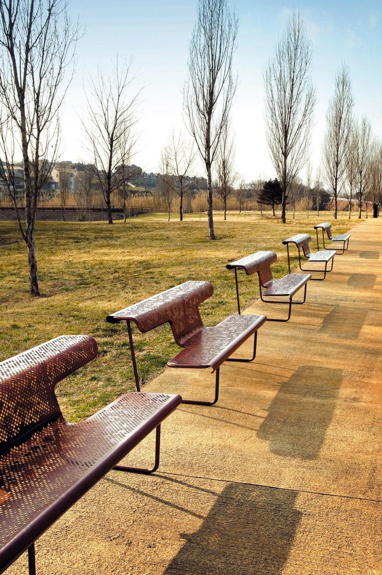 Steel Public bench in perforated steel designed by Alfredo Häberli For Sale