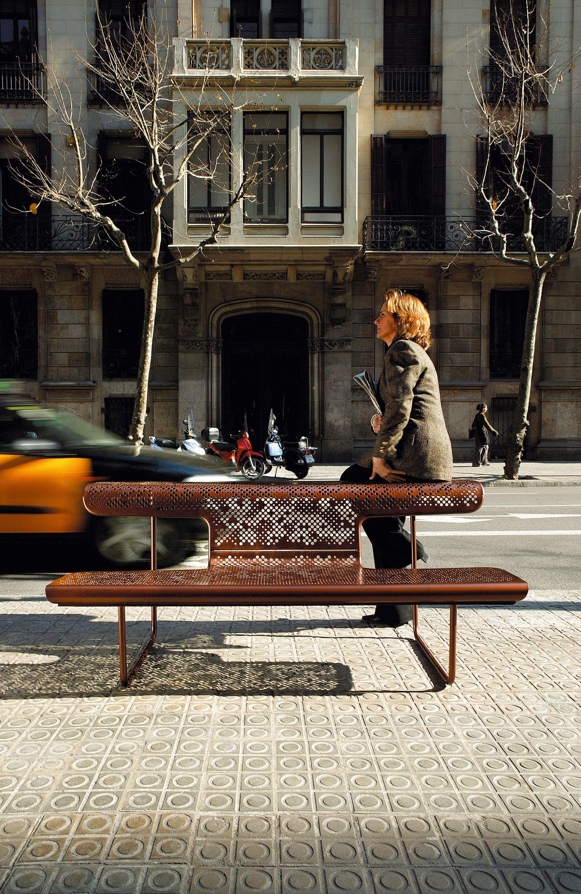 Public bench in perforated steel designed by Alfredo Häberli model 