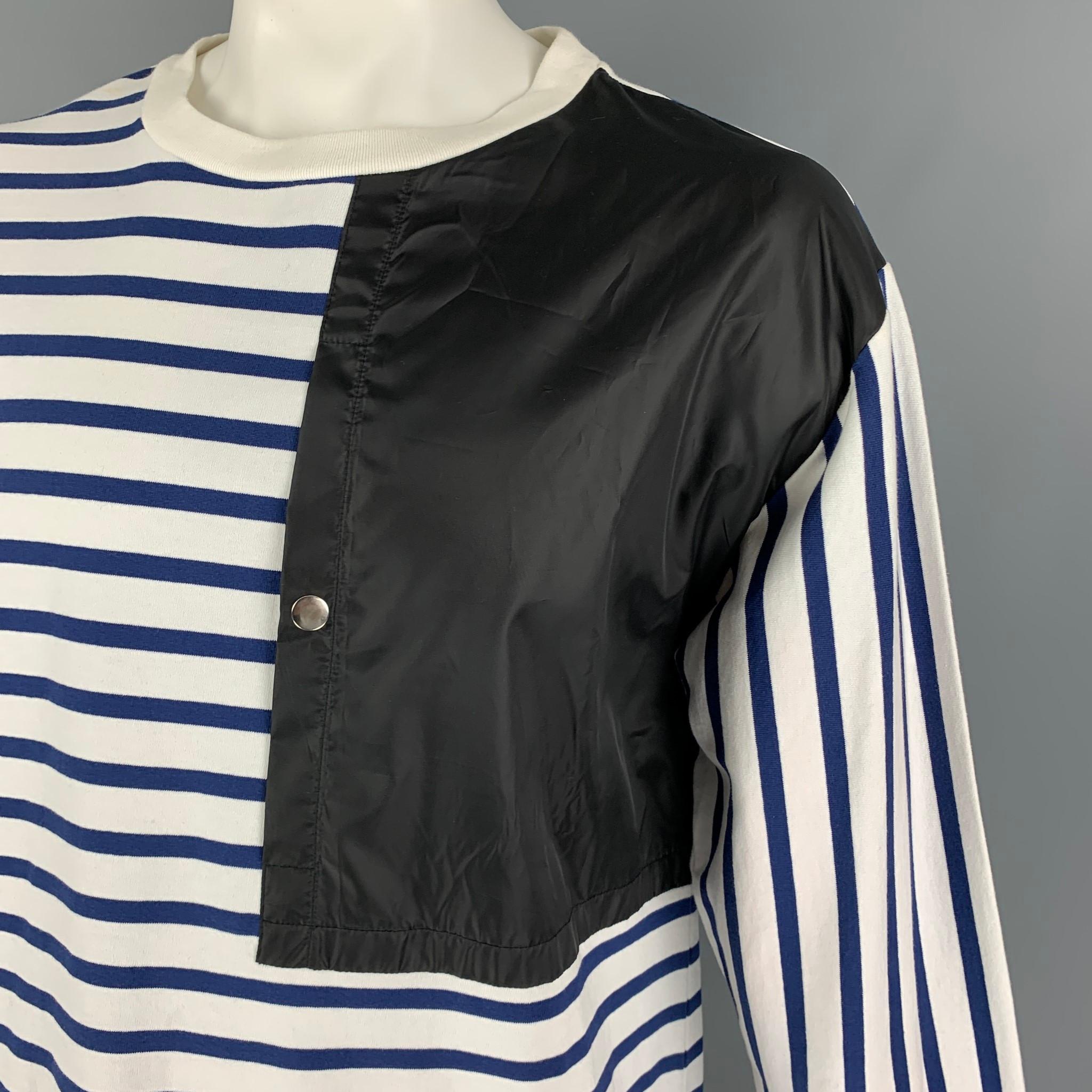 PUBLIC SCHOOL T-shirt comes in a white & blue stripe cotton featuring a elastic hem, black pouch pocket, and a crew-neck. 

Very Good Pre-Owned Condition.
Marked: XL

Measurements:

Shoulder: 22 in.
Chest: 48 in.
Sleeve: 26.5 in.
Length: 29.5 in.