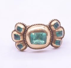 C1690 Iberian 7 Stone Table Cut Emerald Bow Form Ring