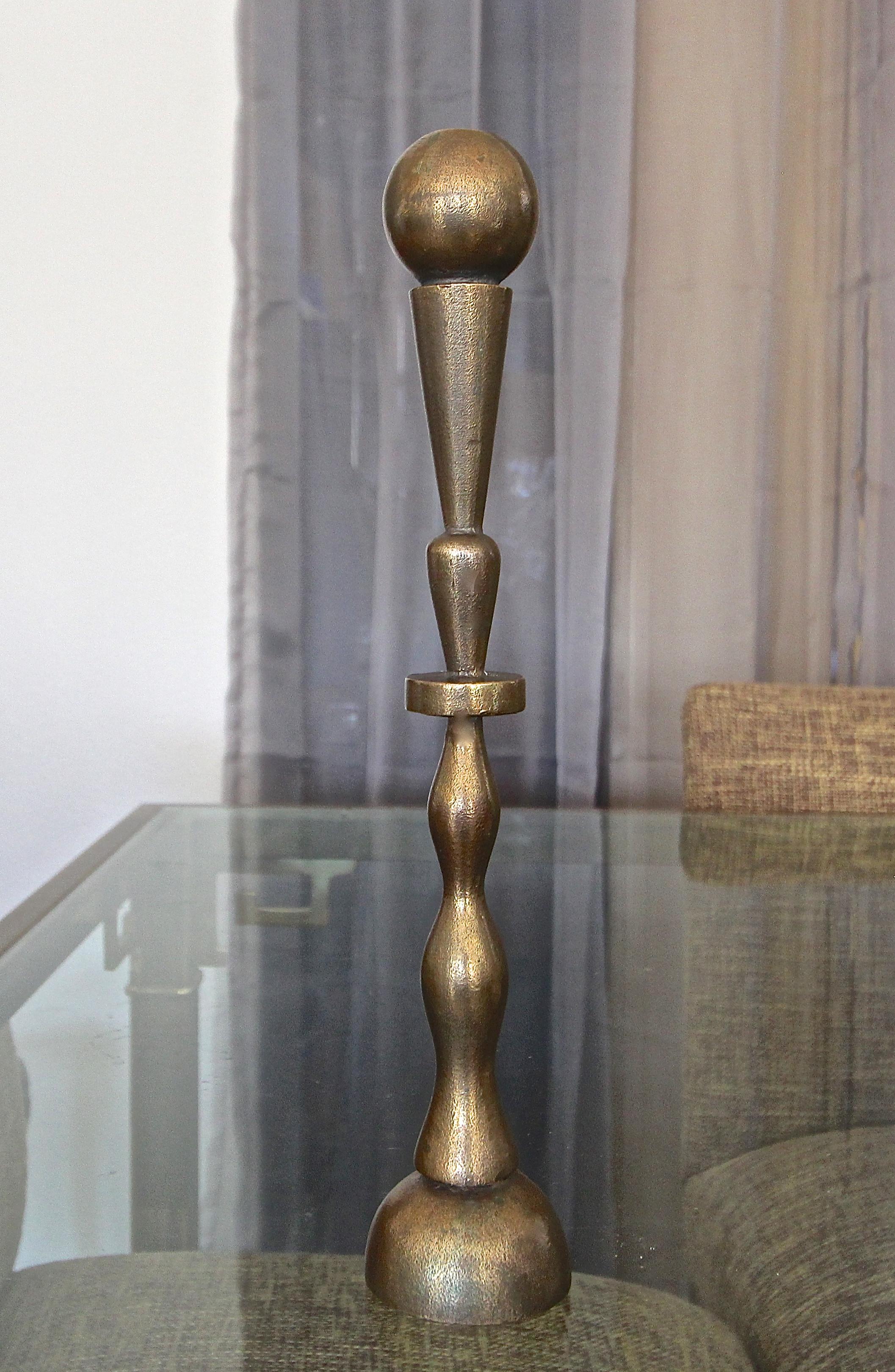 A postmodern design bronze candlestick by Pucci De Rossi. Signed on bottom.

Pucci De Rossi was born in Verona, Italy in 1947.

He studied under the American sculptor HB Walker and began his career in the city of his birth in 1971. His studio