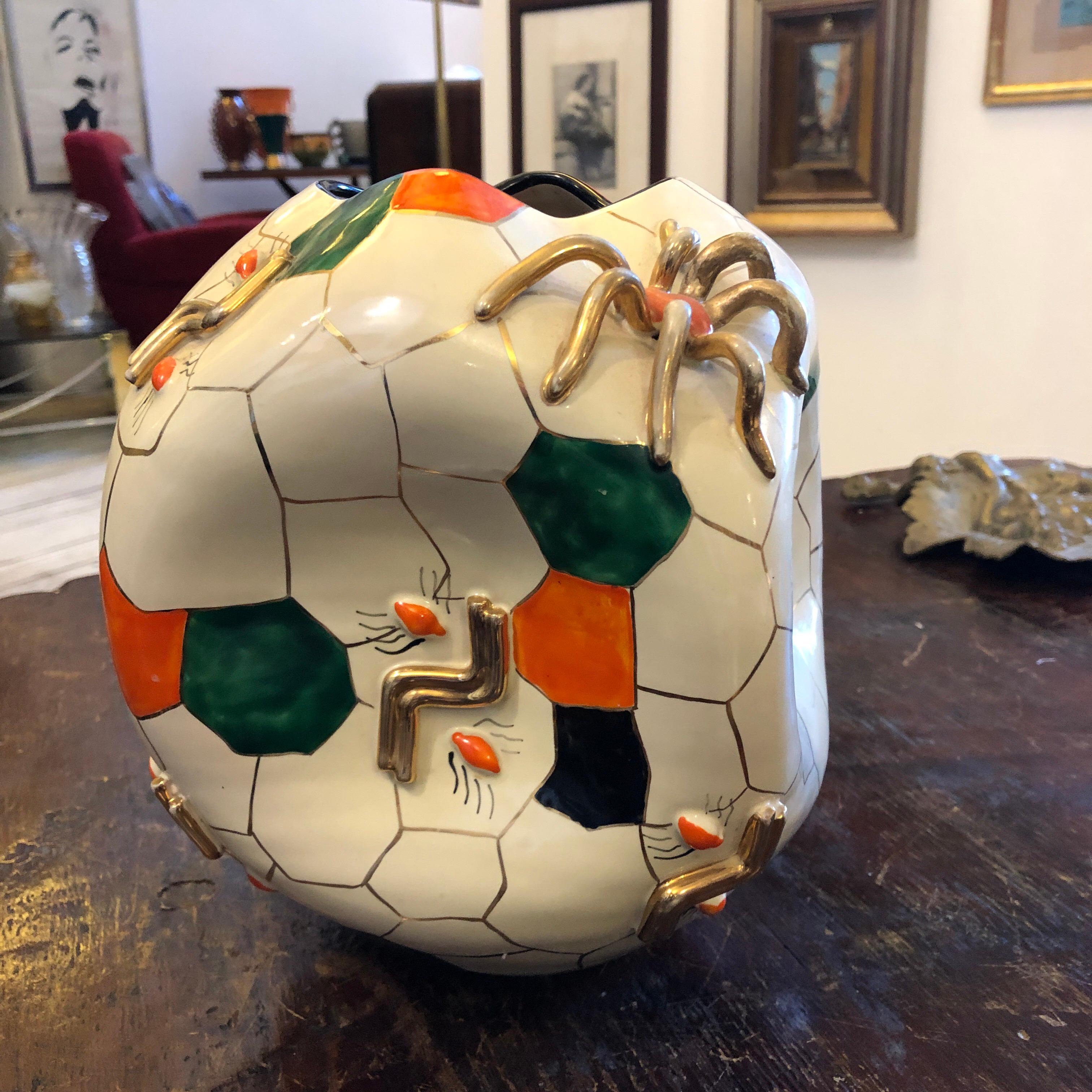 This is one of the most important vase made by Domenico Pucci. It's a cubic spider vase designed and made in 1952, it's on the cover of the book of Pucci ceramics.