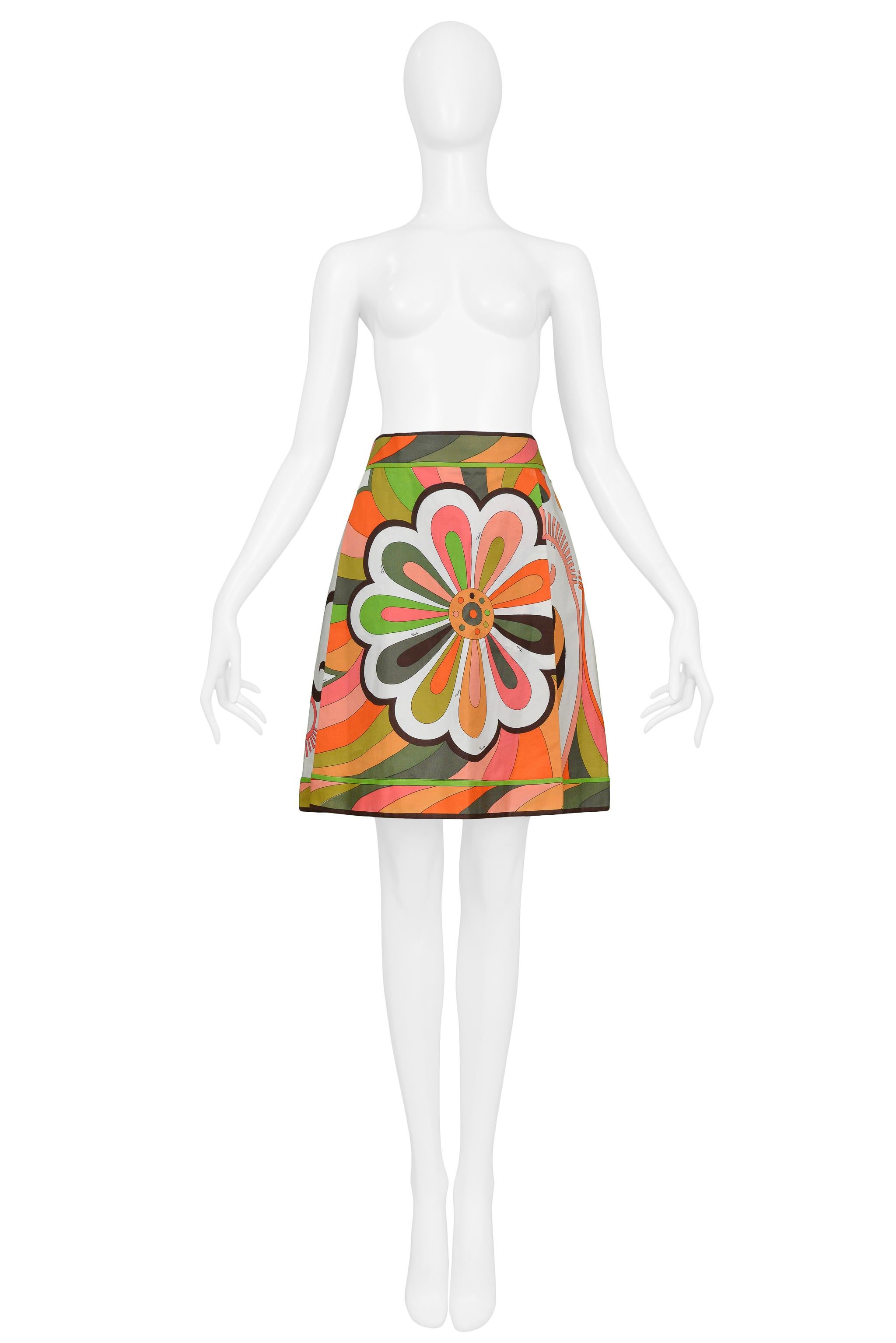 Resurrection Vintage is excited to offer a vintage Emilio Pucci multicolor cotton day skirt featuring an abstract floral print with 