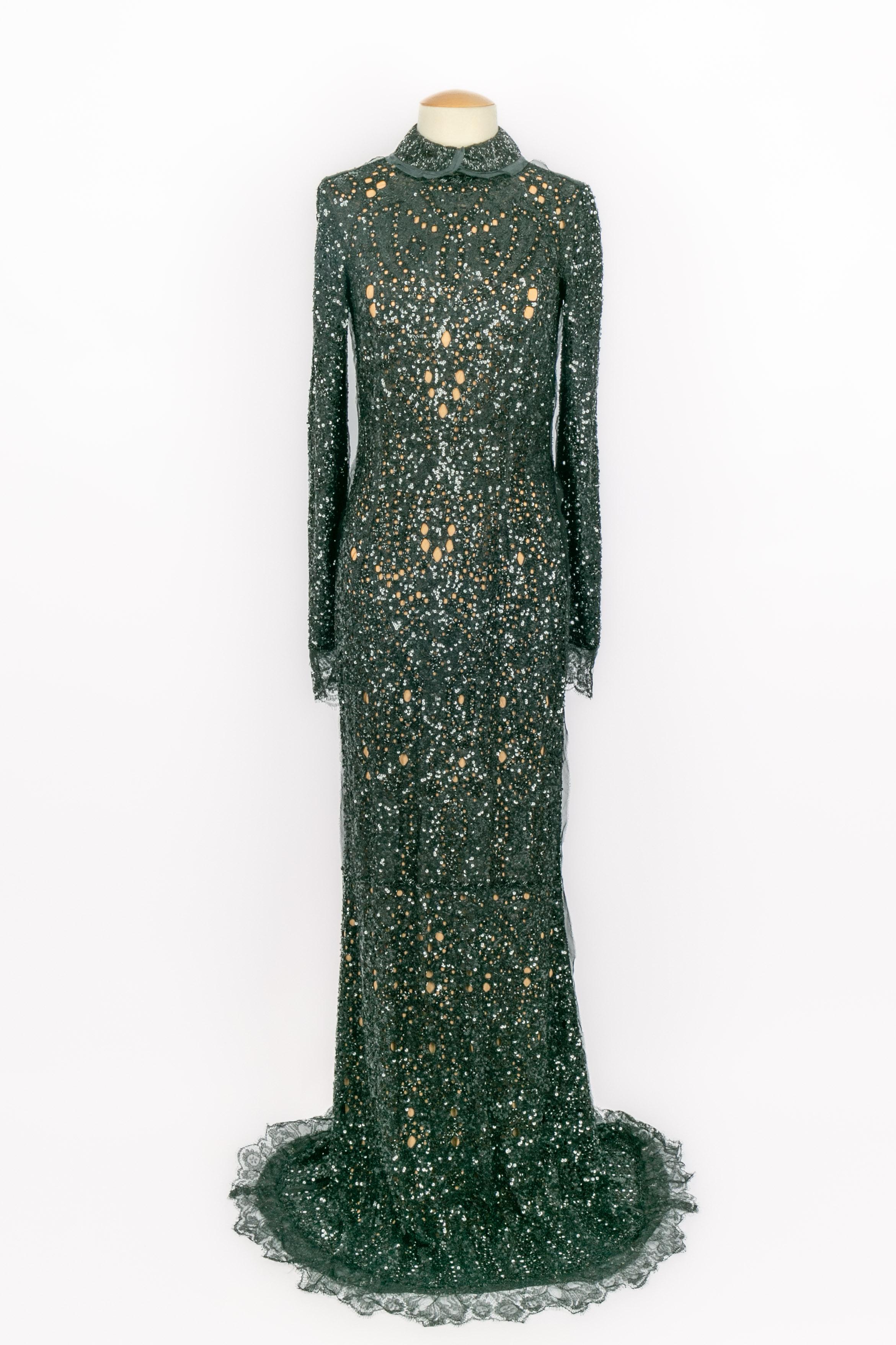 PUCCI - (Made in Italy) Long pearled silk dress with long sleeves, and embroidered with black sequins and pearls. Size 42IT. 2011 Fall-Winter Collection under the artistic direction of Peter Dundas.

Condition:
Very good
