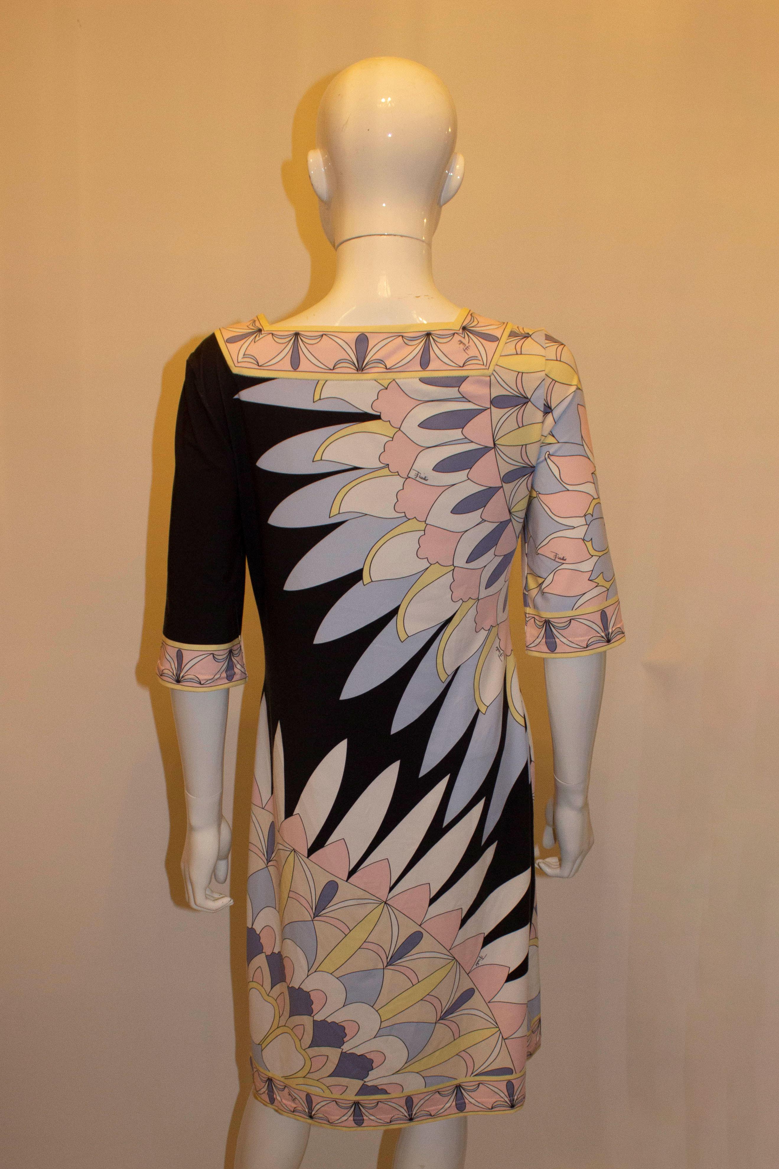 A lovely Pucci silk jersey dress in ice cream colours. The dress has  a square neckline and elbow length sleaves. Made in Italy Size 40 Measurements: Bust up to 36'', length 39''