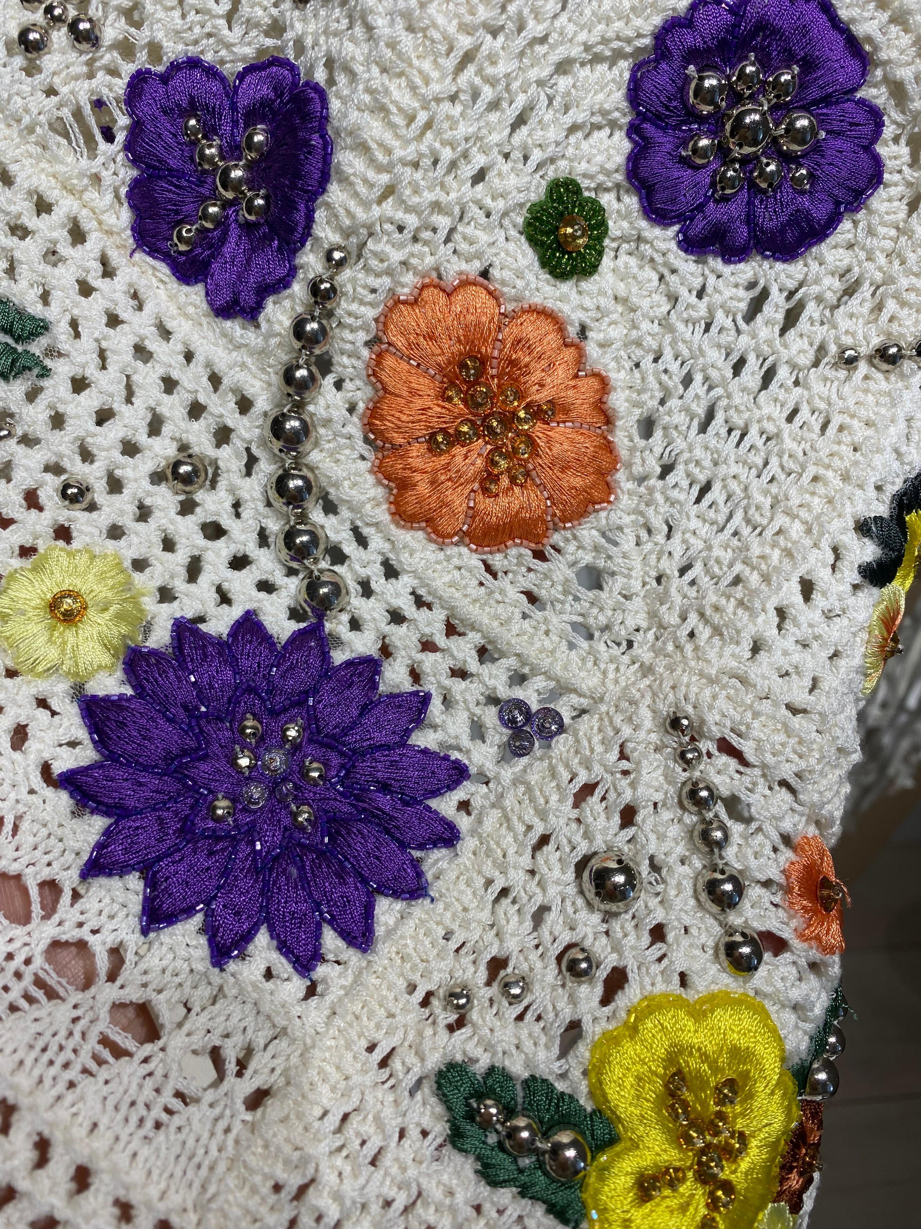 white crochet poncho