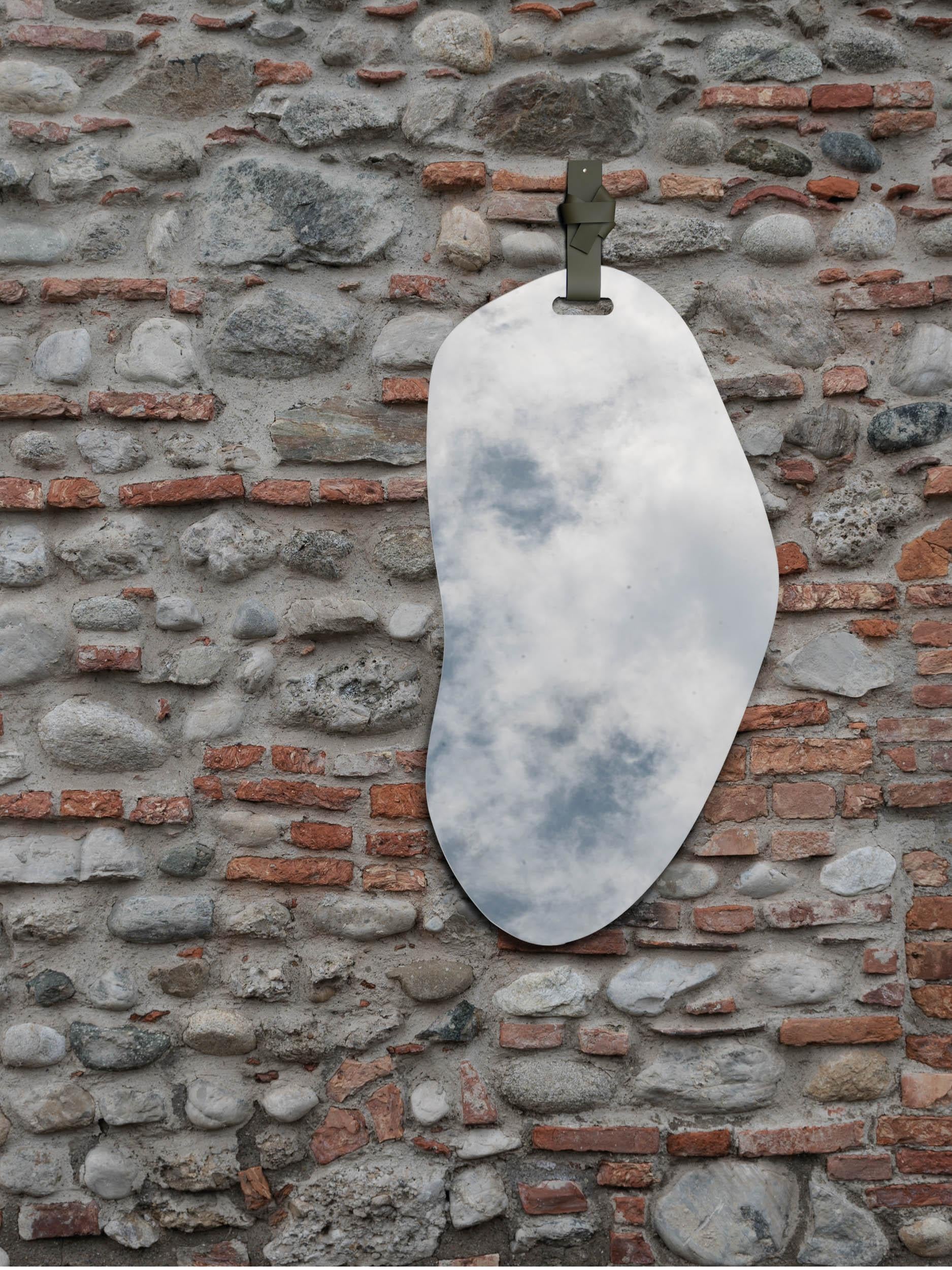 Puddle Large Wall Mirror by Studionudo
Dimensions: Ø 63 x H 138,5 cm.
Materials: Leather and mirror.

Different materials and sizes are available. Dimensions may vary. Please contact us.

Studionudo was born to transform raw materials into objects