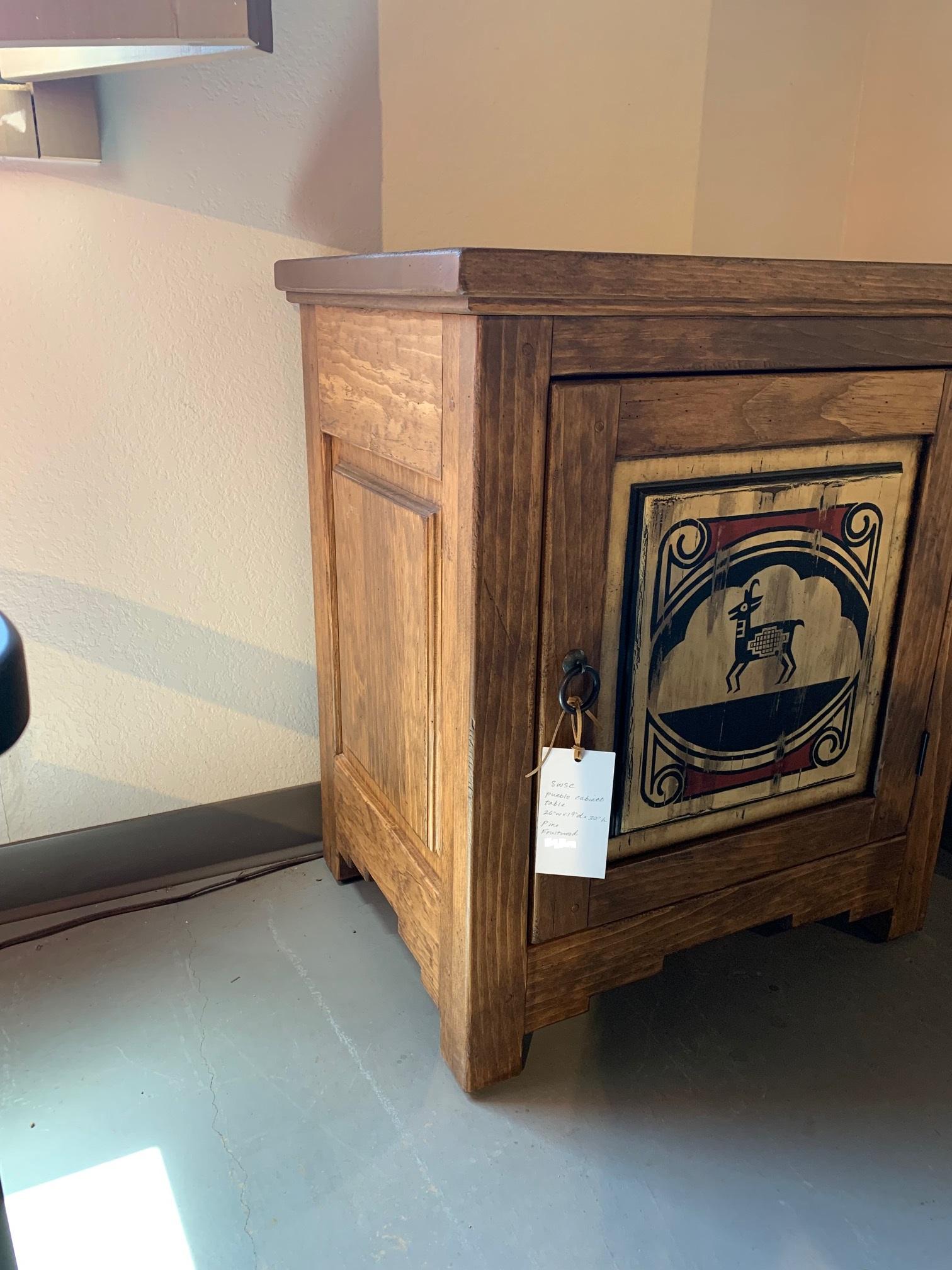 Southwest Spanish Craftsmen Pueblo Cabinet.
Perfect addition to any space. Shelf storage behind single door.

This is a showroom model in perfect condition.