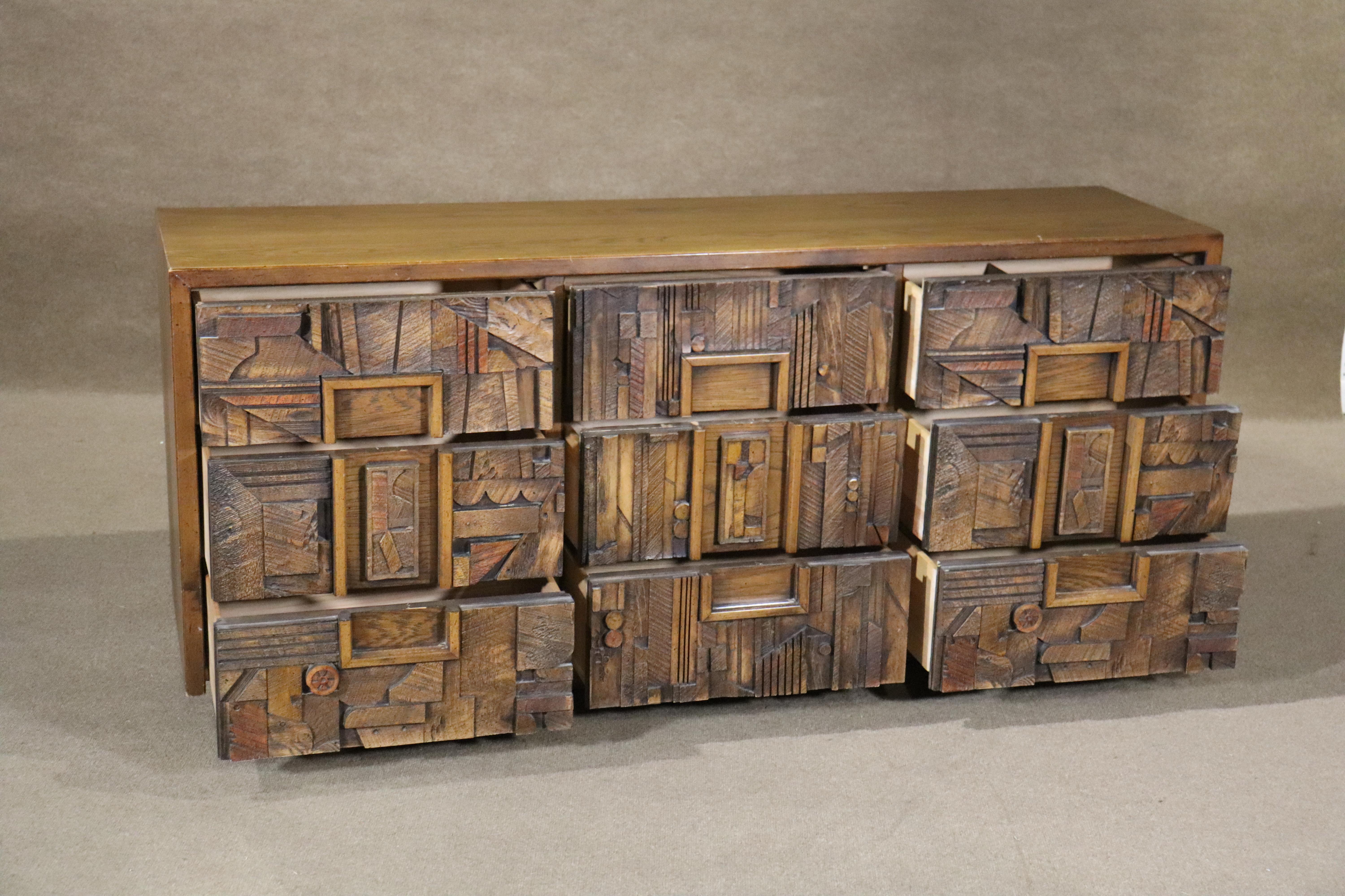 Long nine drawer dresser by Lane with a fantastic mosaic design front. This mid-century dresser features a brutalist style similar to Paul Evans.
Please confirm location NY or NJ