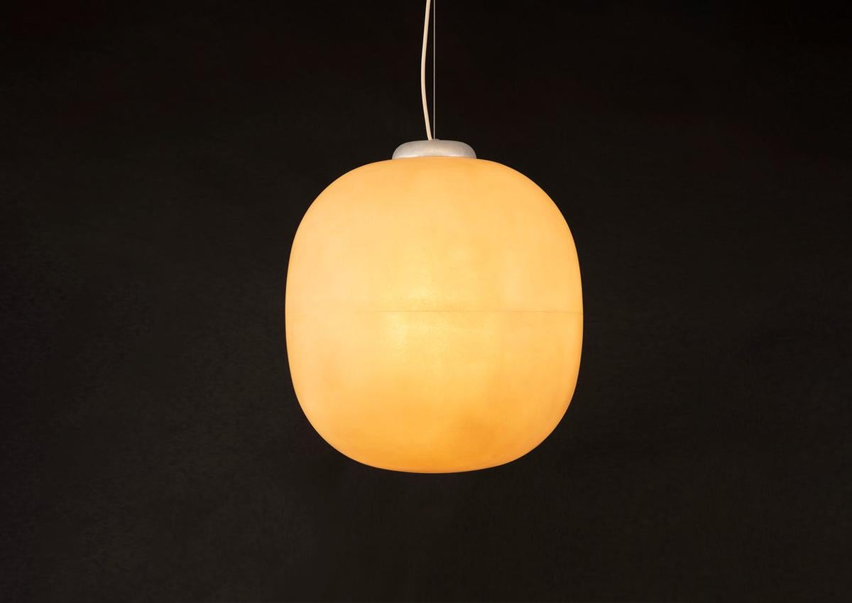 Puffball, a collection of minimal lamps, draws inspiration from the rounded caps and columned stalks of wild mushrooms and toadstools. The chunky silhouettes, made of raw fiberglass and tumbled or painted aluminum, give off a warm luminescent glow.