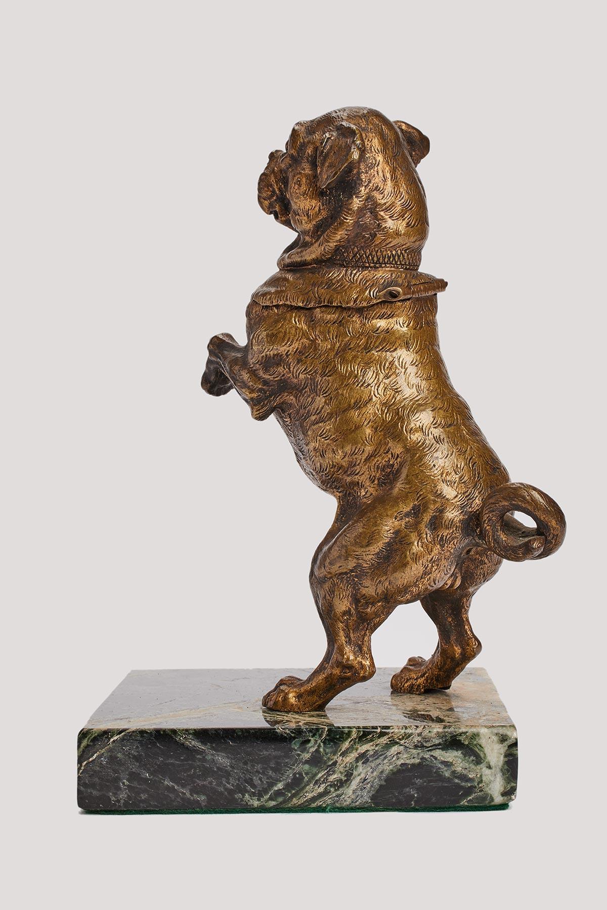 Lost wax processed inkwell depicting a pug dog, standing over a green marble base. Head reclines revealing the ink reservoir. Original patina, Vienna, 1890 ca.