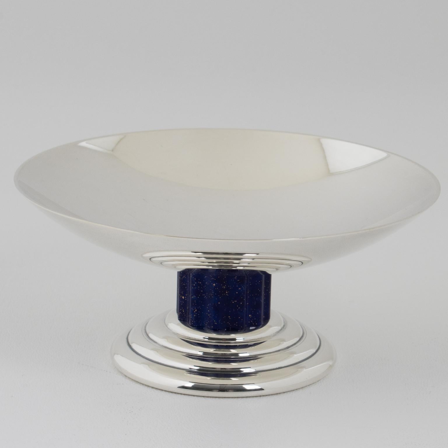 This lovely silver plate coupe, ring holder, bowl, or tazza was crafted by Puiforcat, France. Jean Puiforcat designed this elegant piece in the 1930s, the Art Deco period. Puiforcat France continued editing this collection until the 1970s. This