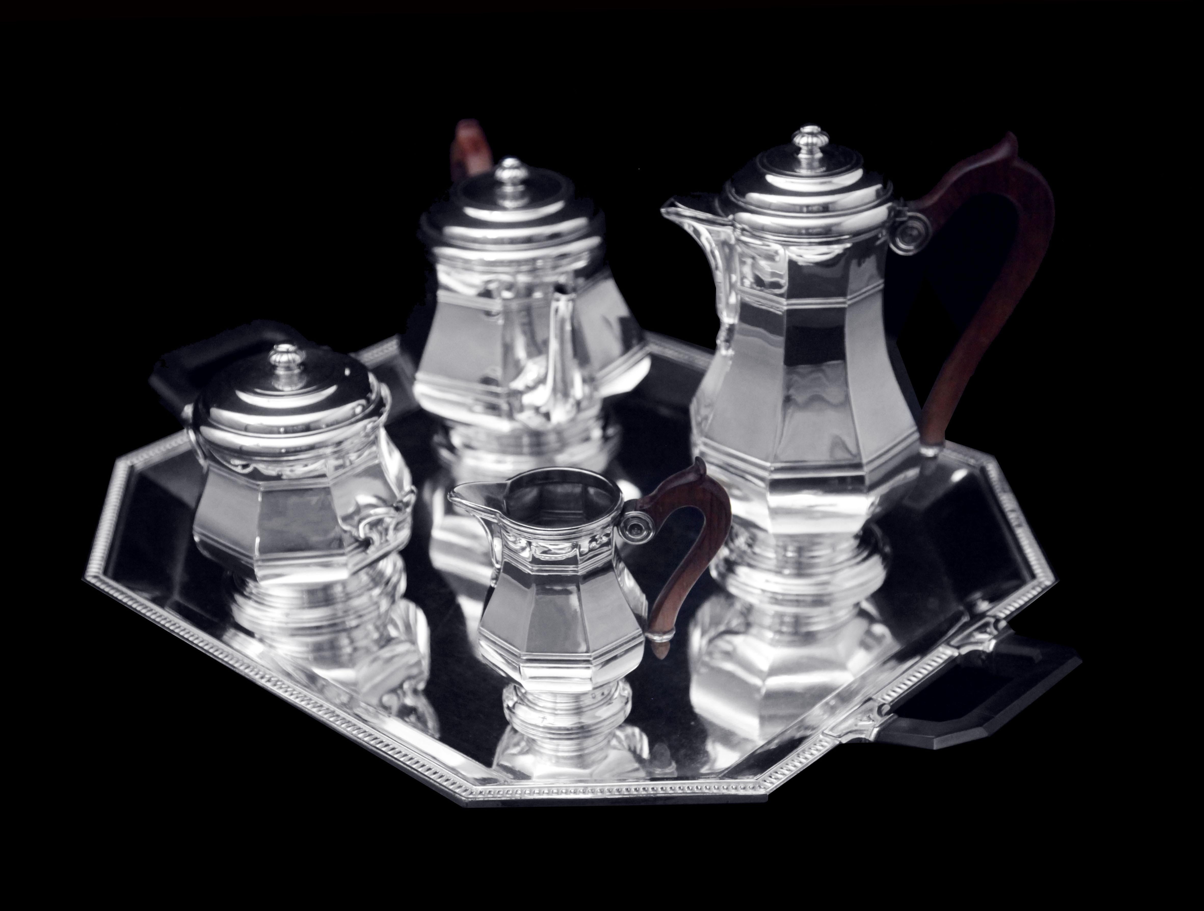 Direct from Paris, the birthplace of Art Deco, a magnificent 5-piece original French Art Deco (Gatsby era) sterling silver tea set by two of the world’s premier French silversmiths “Puiforcat”, currently owned by Hermes, and “Christofle”.  The set