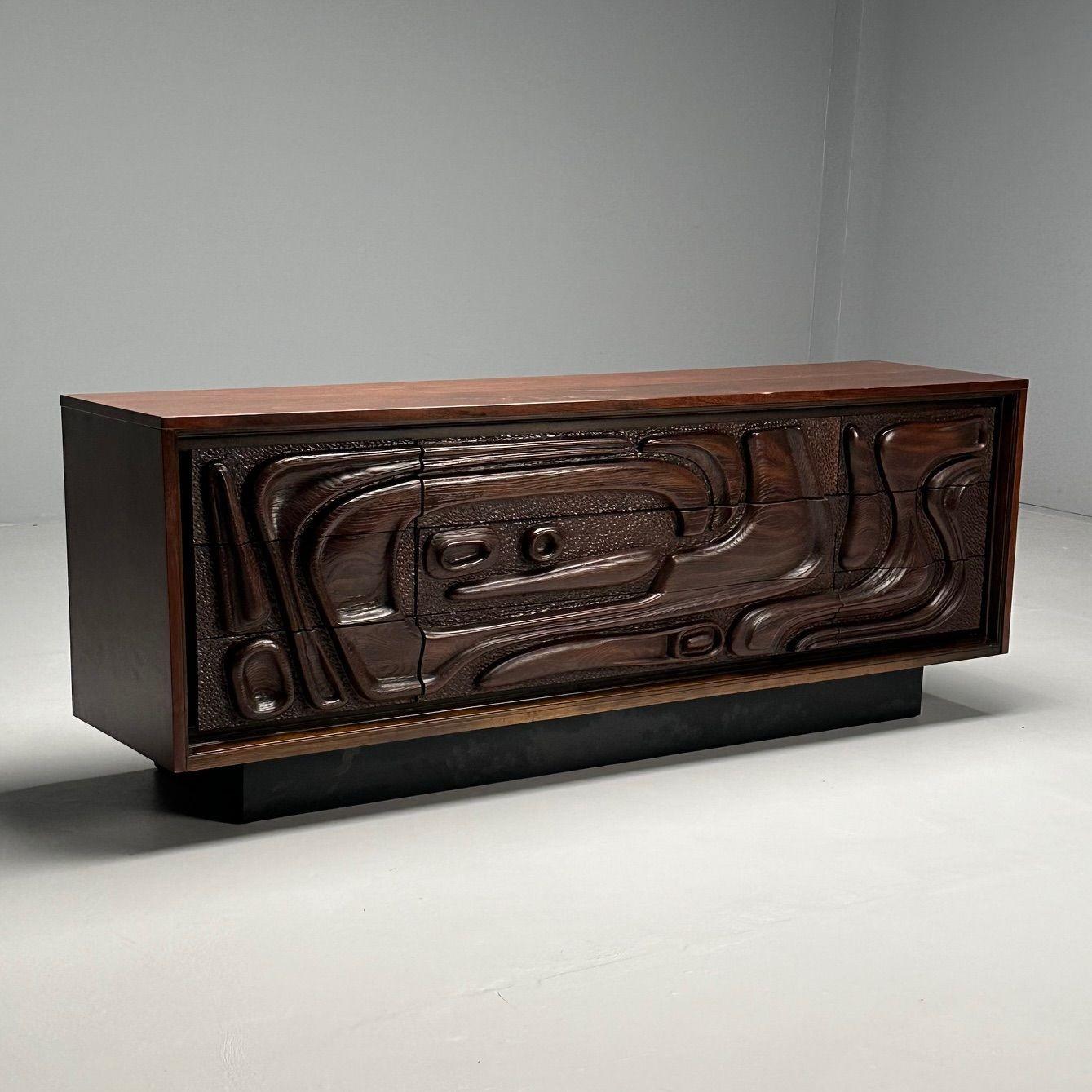 Pulaski, Brutalist Mid-Century Modern, 'Oceanic' Sculptural Dresser, Walnut, 1960s

Nine drawer dresser designed and produced by Pulaski Furniture Corporation in the United States circa 1960s. The 'Oceanic' Collection is often misattributed to Witco