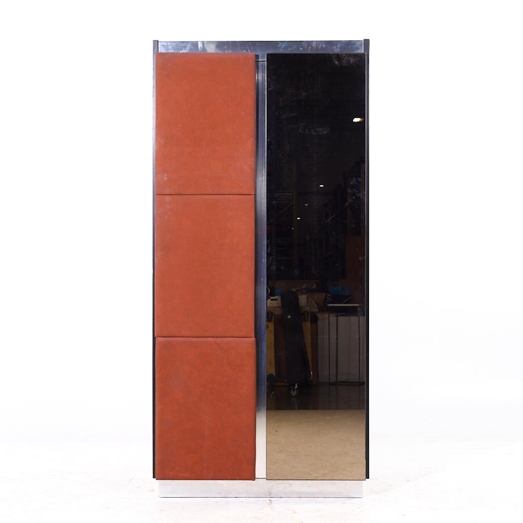 Pulaski Mid Century Rosewood, Leather and Chrome Armoire Dresser

This armoire measures: 36 wide x 19.25 deep x 76.25 inches high

All pieces of furniture can be had in what we call restored vintage condition. That means the piece is restored upon