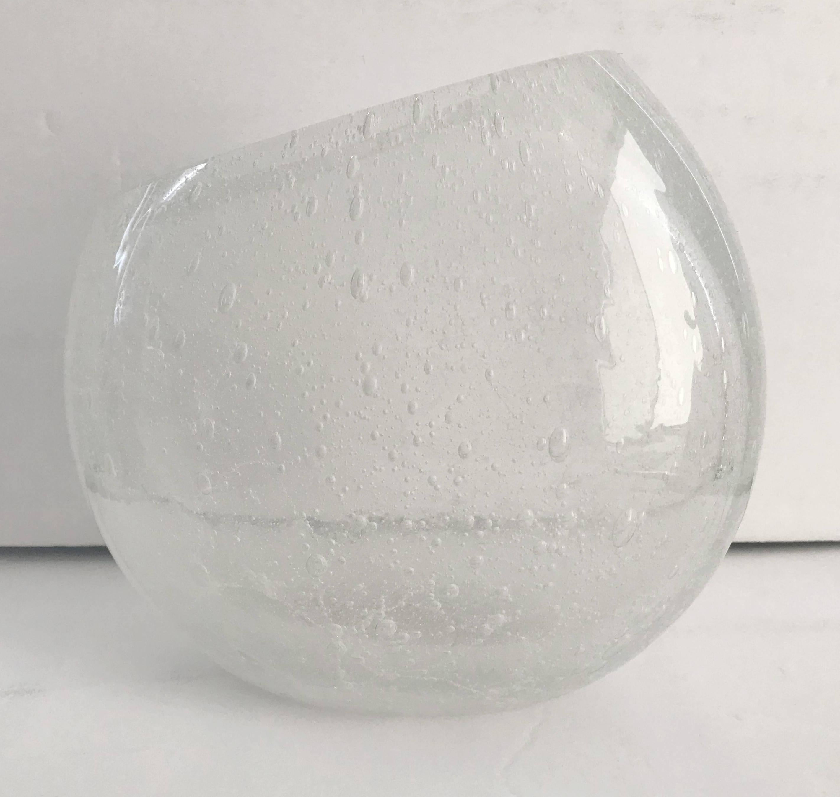 Italian vase or sculpture in thick clear Murano glass hand blown with bubbles within the glass in Pulegoso technique / made in Italy by Studio Pino Signoretto, circa 1970s
Signature engraved on the base
Measures: Height 8.5 inches, width 9 inches,