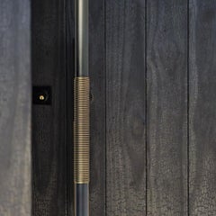 Door pull in gunmetal patinated brass with antique gold brass wires 70 cm