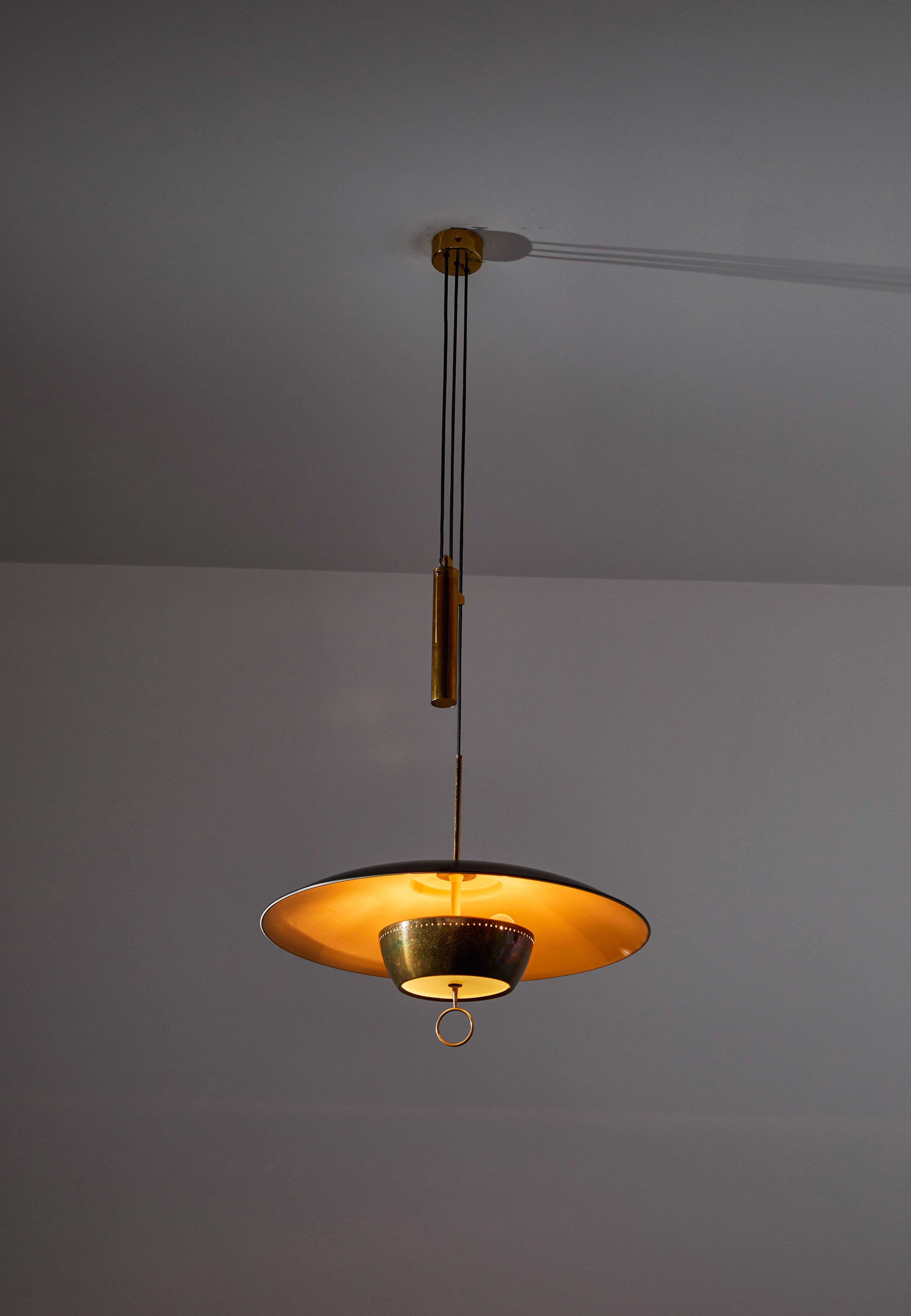 Pulley pendant by Gaetano Sciolari for Stilnovo. Made in Italy, circa 1950s. Enameled metal shade, glass diffuser, solid brass pulley which adjust height from 60