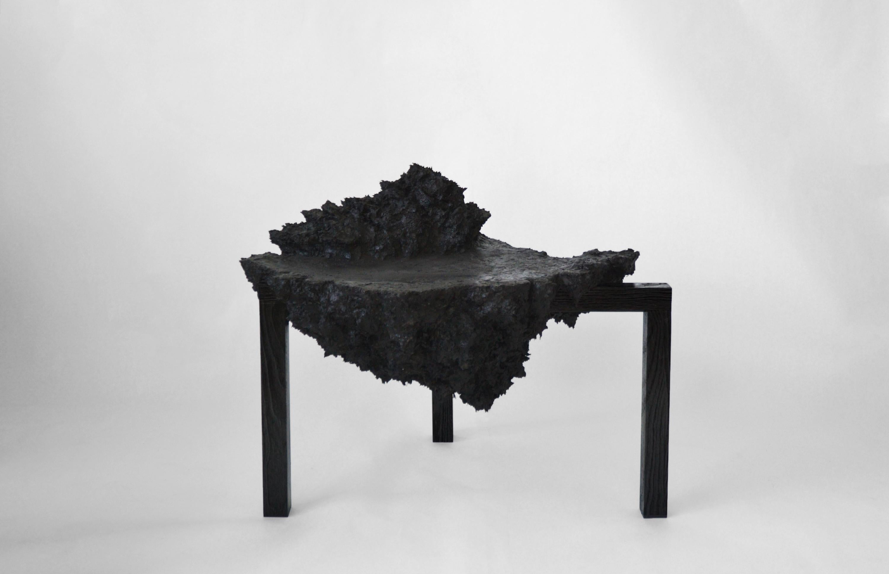 Pulp chair, sustainable sculptural design by Isac Elam Kaid 
Each chair is unique and hand-sculpted by Isac Elam Kaid
Dimensions: 76 W x 61 D x 61 H
Materials: plastic paper waste, ash frame, Indian ink, mixed-media.

Isac Elam Kaid is an