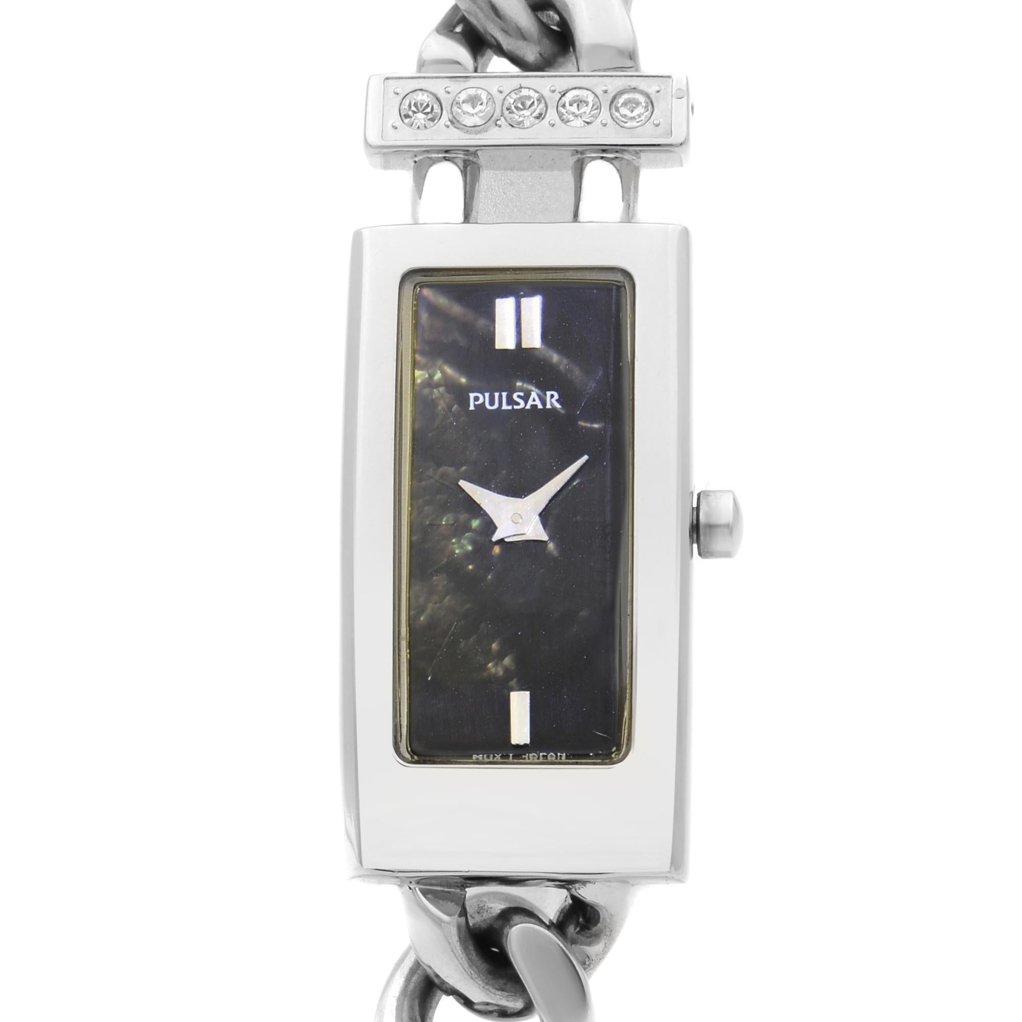 This pre-owned beautiful Pulsar Stainless Steel MOP Dial Quartz Ladies Watch 1N00-X125, with Quartz (Battery) Movement, and has a rectangular shape, black mother of pearl dial, silver-tone hands, and stick index. The bracelet is adjustable and it