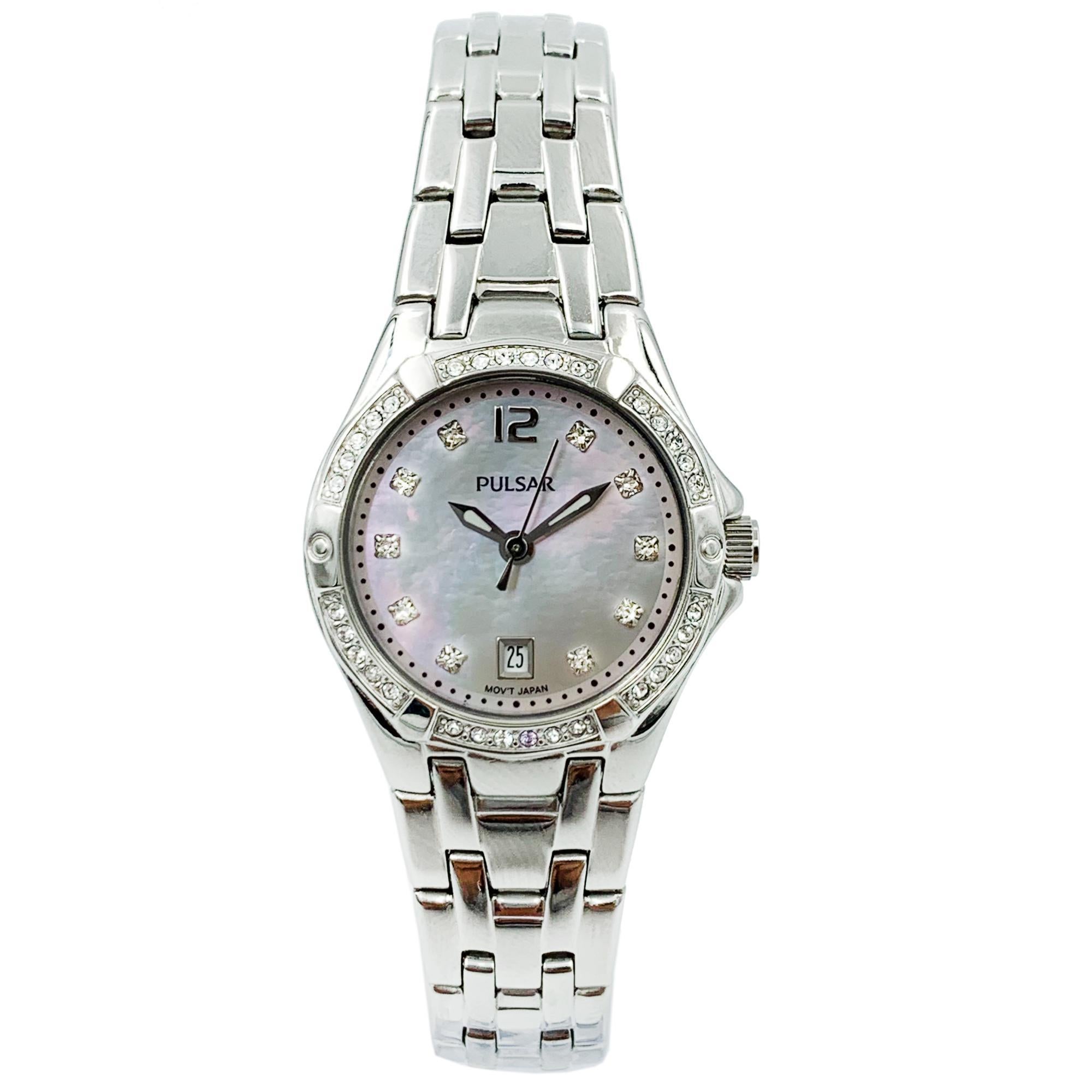 Display Model Pulsar Swarovski Crystal Steel MOP Dial Quartz Ladies Watch With Necklace PXT913. This Beautiful Timepiece is Powered by a Quartz (Battery) Movement and Features: Stainless Steel case and Bracelet, Fixed Stainless Steel Bezel Set with