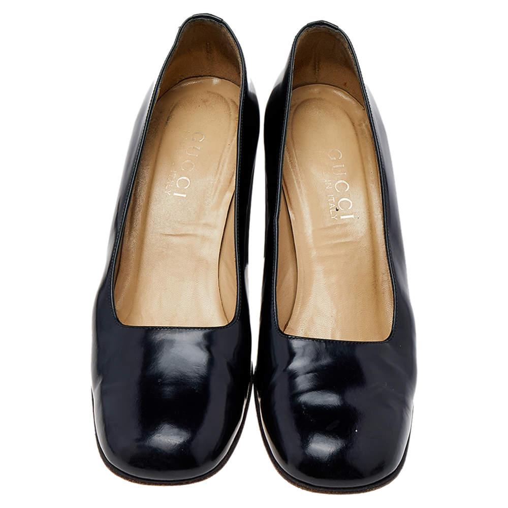 These black pumps from Gucci are a smart pick for everyday use. They are crafted from leather and feature square toes. They are equipped with comfortable leather-lined insoles and elevated on block heels.

