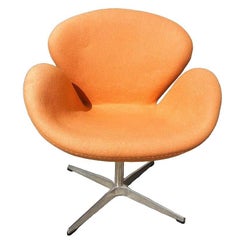 Punmkin Orange Swan Chair in the style of Arne Jacobsen