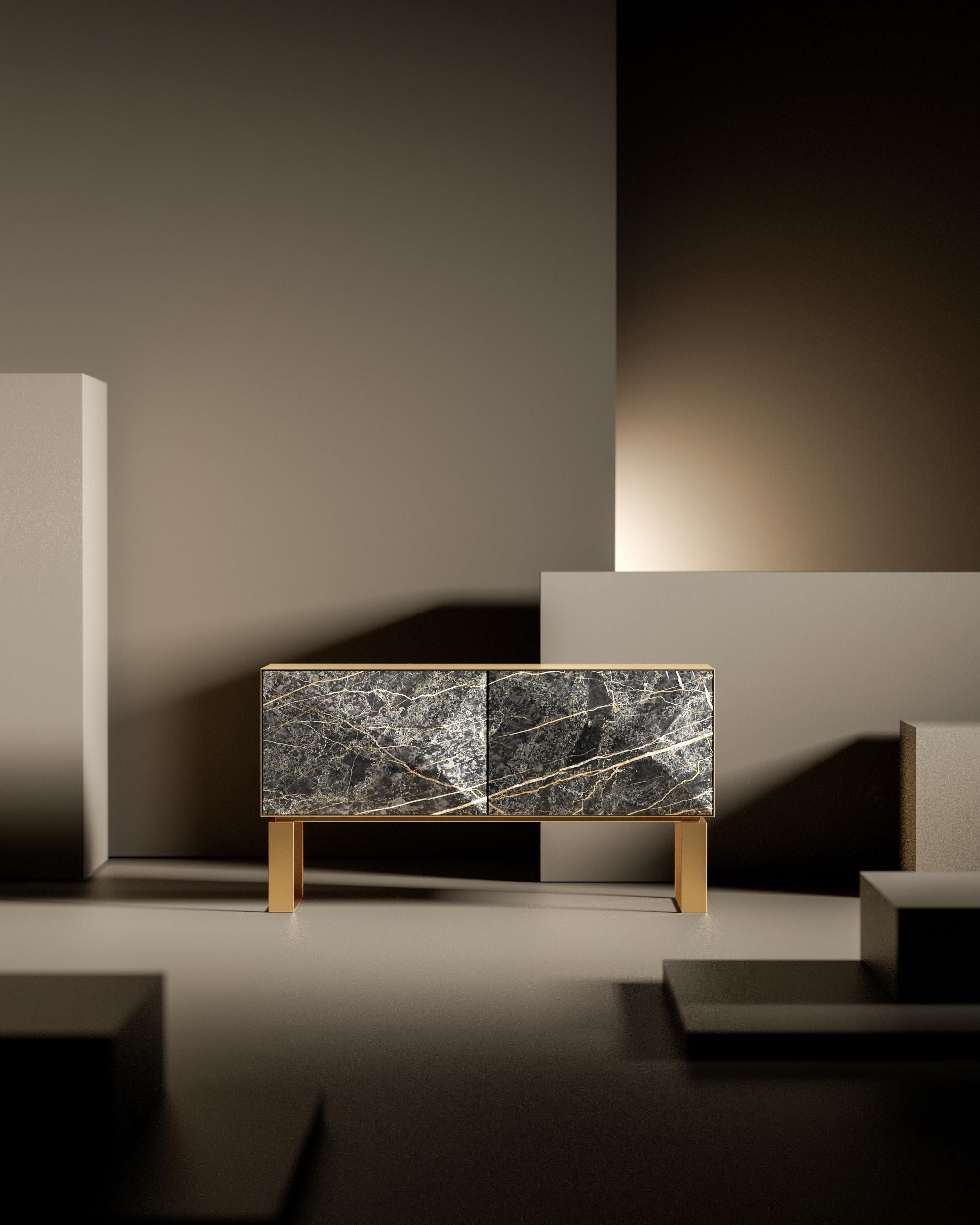 Create comfortable and elegant spaces with the geometric surfaces of Punta cabinet. Punta cabinet will bring the whole room to a new level of elegance thanks to its minimalist shapes that create a play of lines between the textures of the slabs and