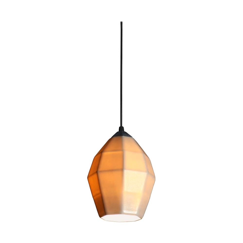 7.5 inch hanging pendant light the smallest of the Extension collection, this hanging pendant emits a soft, elegant glow through a translucent geometric porcelain shade, shining direct downward light through the open base. It’s the perfect modern