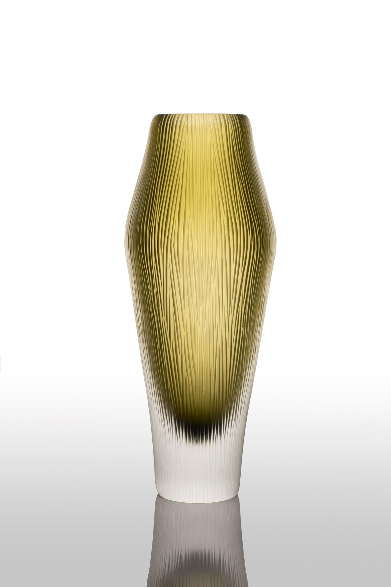 Puparin vase by Purho
Dimensions: D12 x H32 cm
Materials: Murano glass
Available in other colors.

Puparìn is a vase from the Laguna Collection designed by Ludovica+ Roberto Palomba for Purho in spring 2022.
Thin, slender and marked by a thick