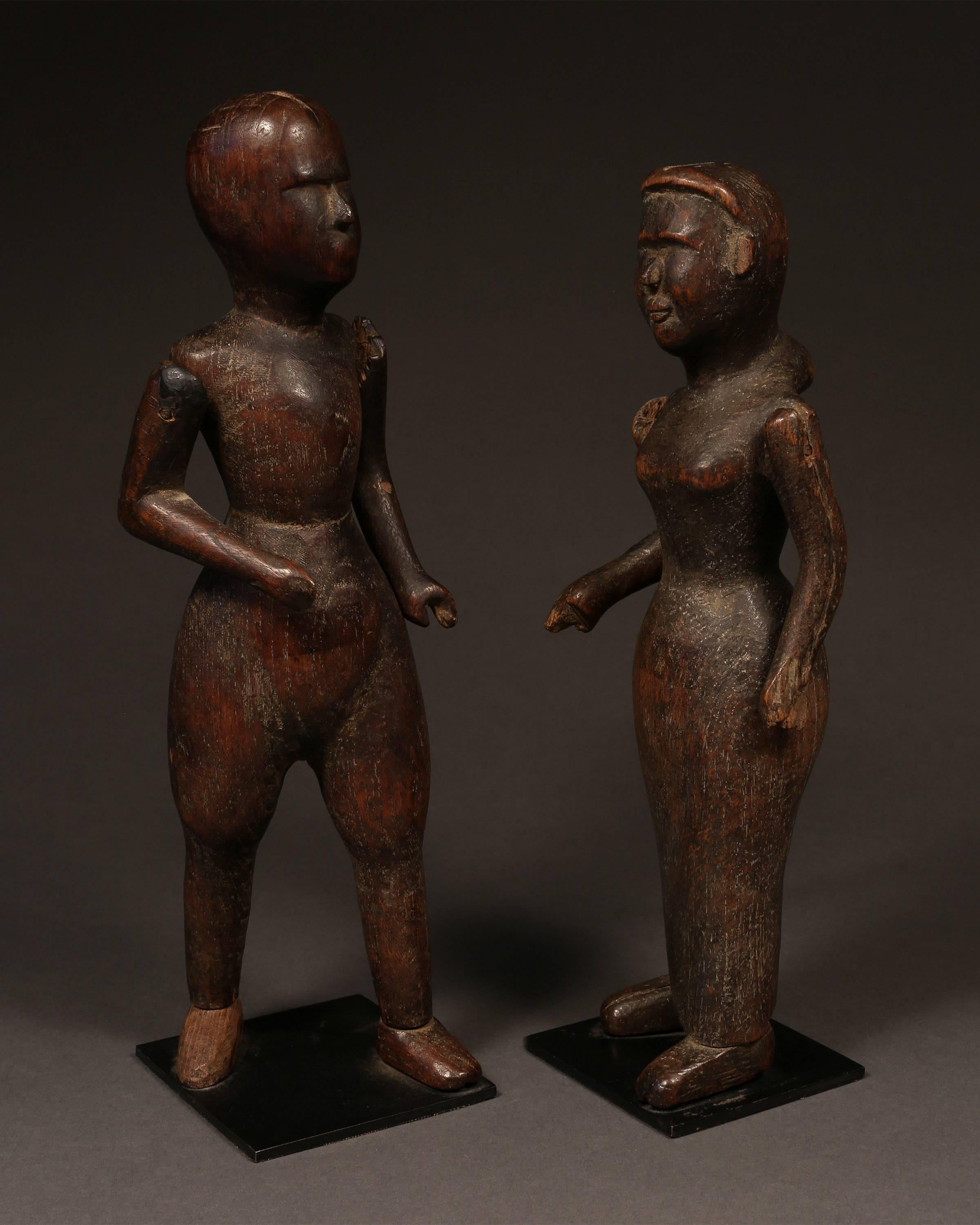 Puppet doll molds from Burma, early 20th century
The enigmatic faces of this unusual pair of standing figures express nobility and strength. The sculpted, articulated doll molds were covered with papier-mâché to fabricate toy puppets.