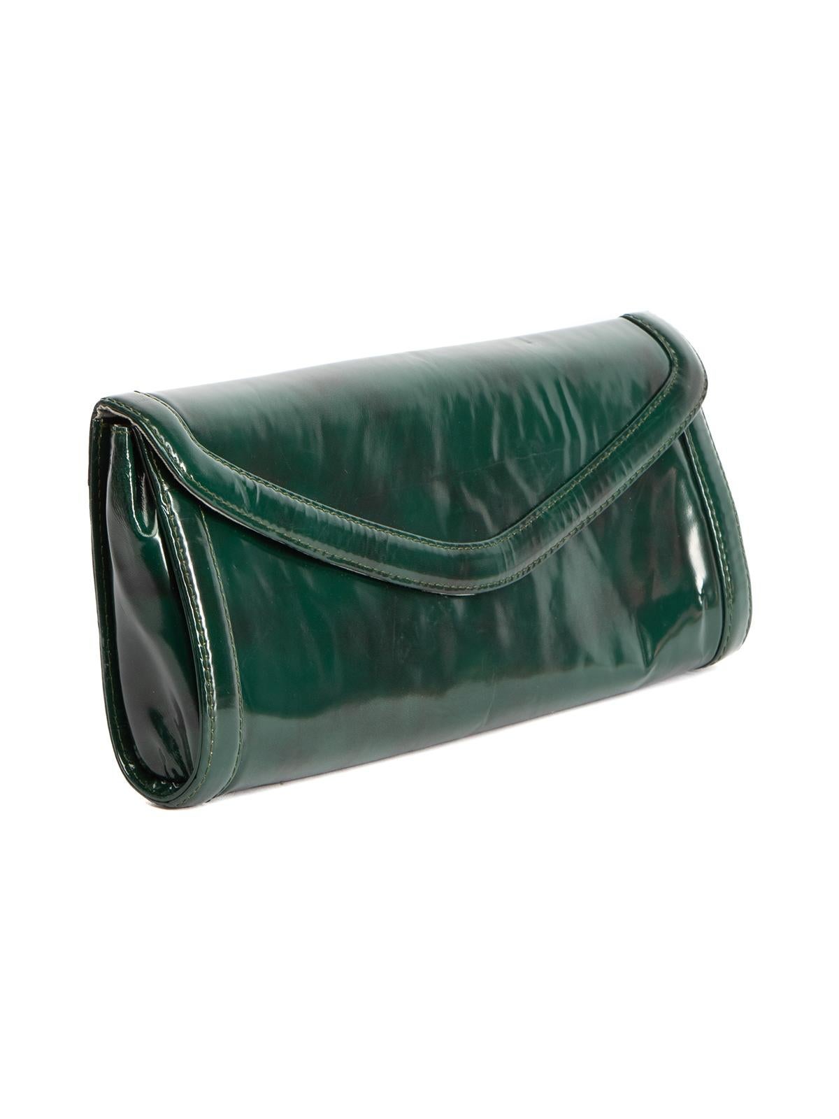 CONDITION is Good. Minor wear to clutch is evident. Light wear to Leather exterior with some creasing seen on this used Pura Lopez designer resale item. Original dust bag included.



Details 


Green 

Leather 

Clutch

Magnetic closure 

One main