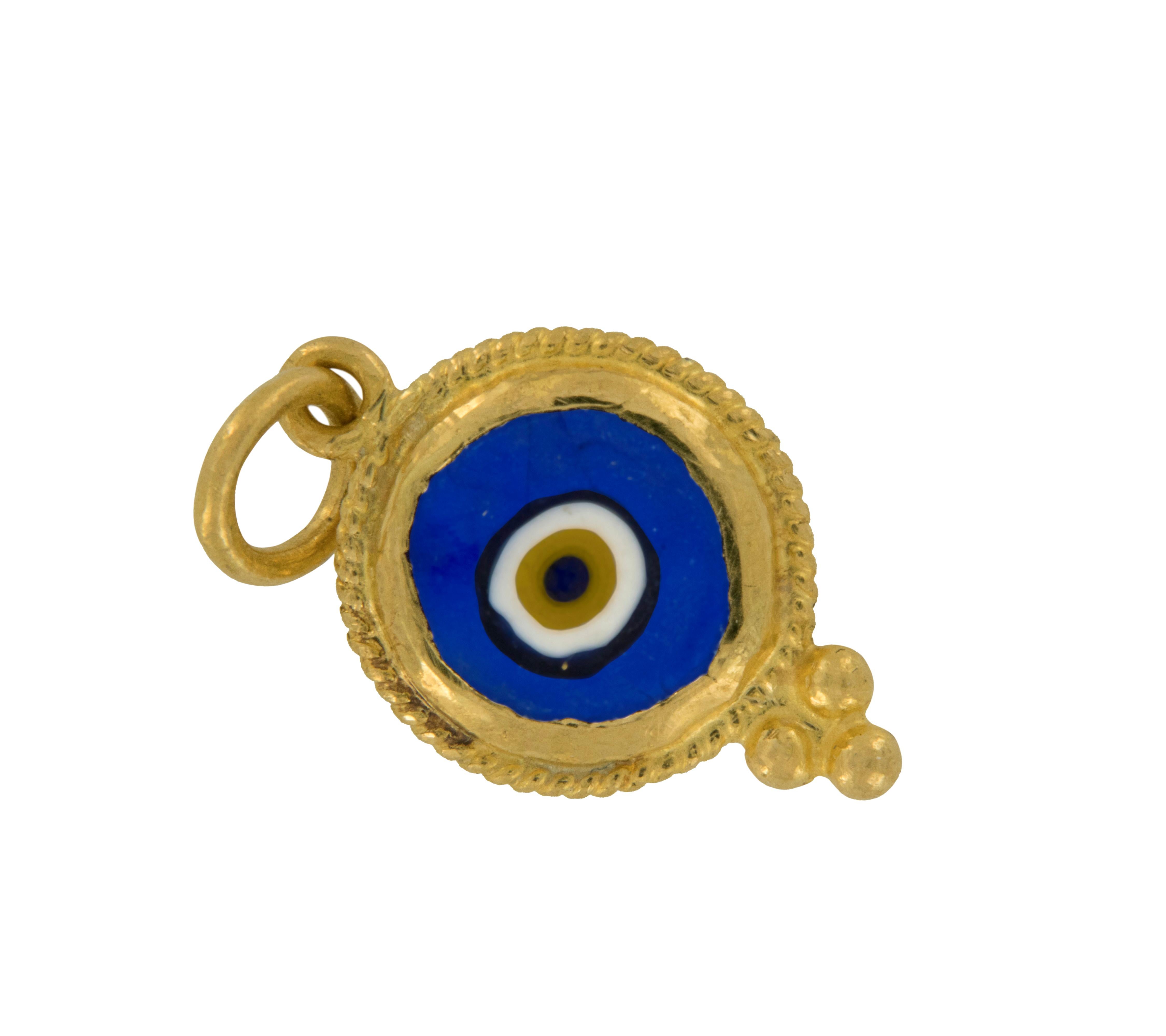 Rarest of all the golds, 24 karat gold is valued by all discerning investors. With it's unmistakable warm yellow color & hammered finish, this evil eye pendant / charm talisman is thought to keep you safe from curses. Blue is the traditional color