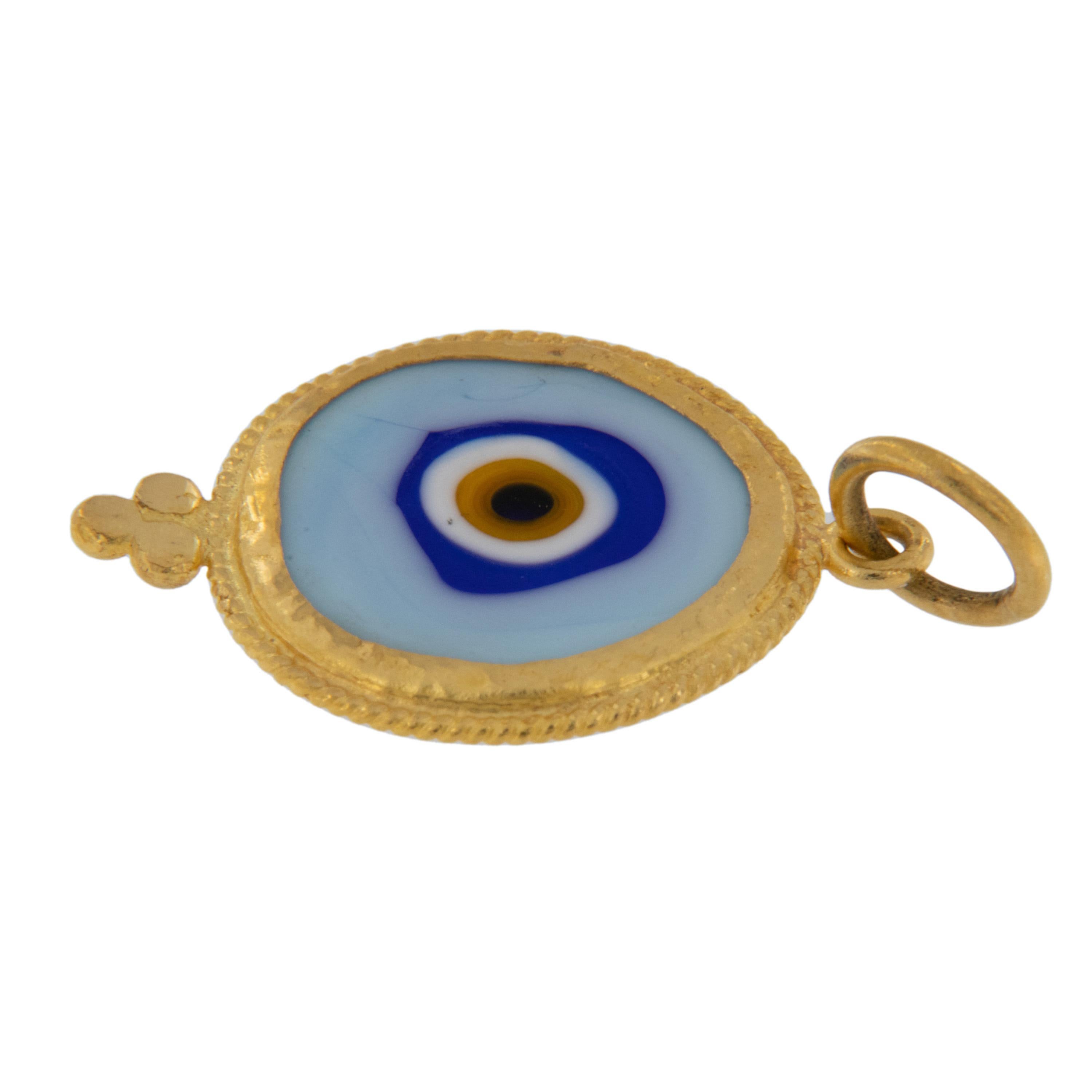 Rarest of all the golds, 24 karat gold is valued by all discerning investors. With it's unmistakable warm yellow color & hammered finish, this large evil eye pendant / charm talisman is thought to keep you safe from curses. Light Blue: Color of the