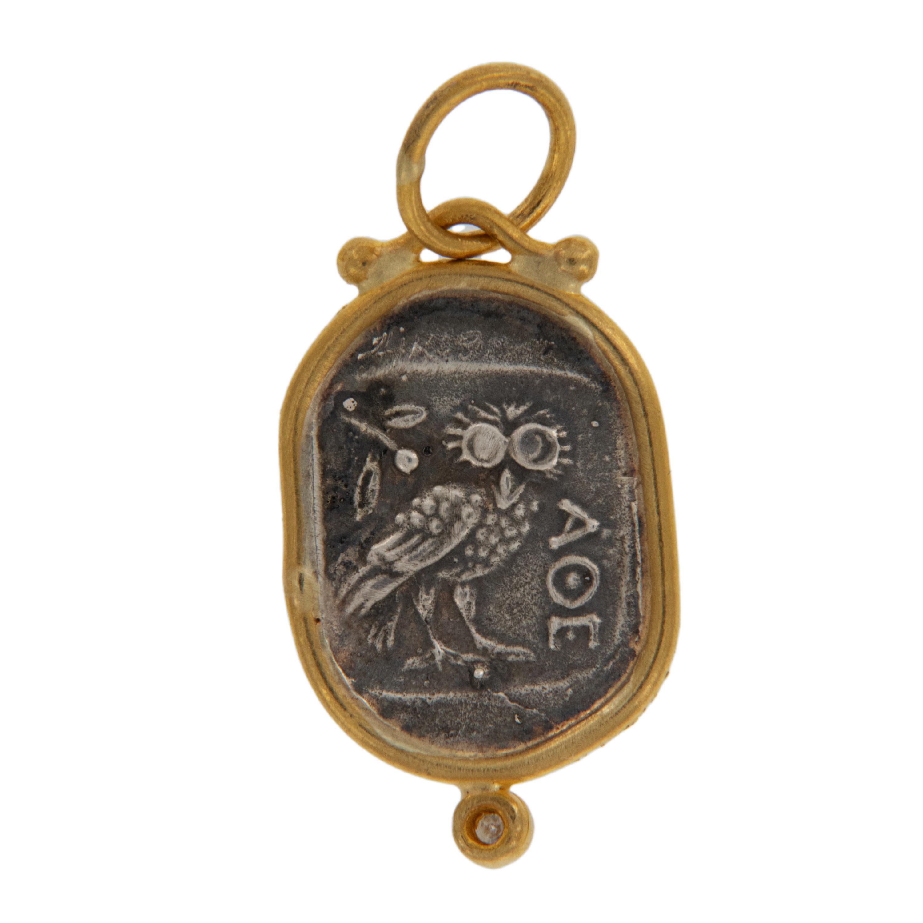 Rarest of all the golds, 24 karat gold is valued by all discerning investors. With it's unmistakable warm yellow color & hammered finish this ancient square replica Athena Wisdom Goddess coin with  accented with diamond is truly museum quality. The