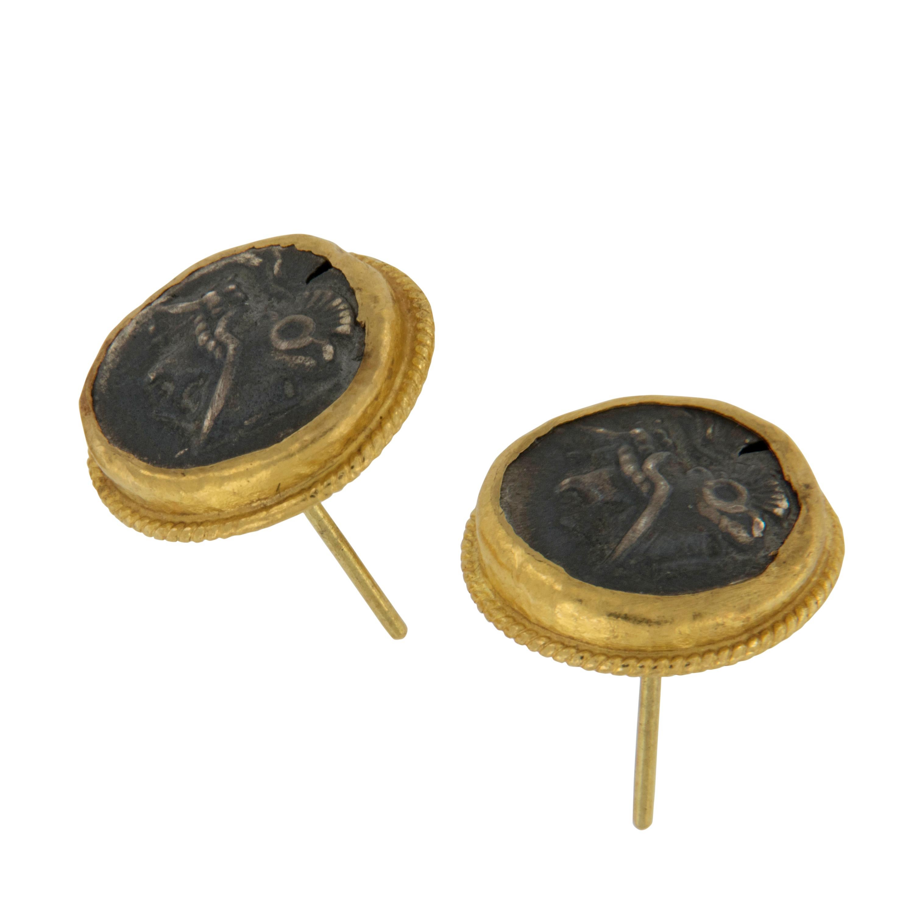 Cherished for it's warm color, these pure 24 karat yellow gold earrings encompass sterling silver replica Roman coins for a dynamic combination! Made with posts & 18 karat gold friction backs for security of wear these earrings are timeless.