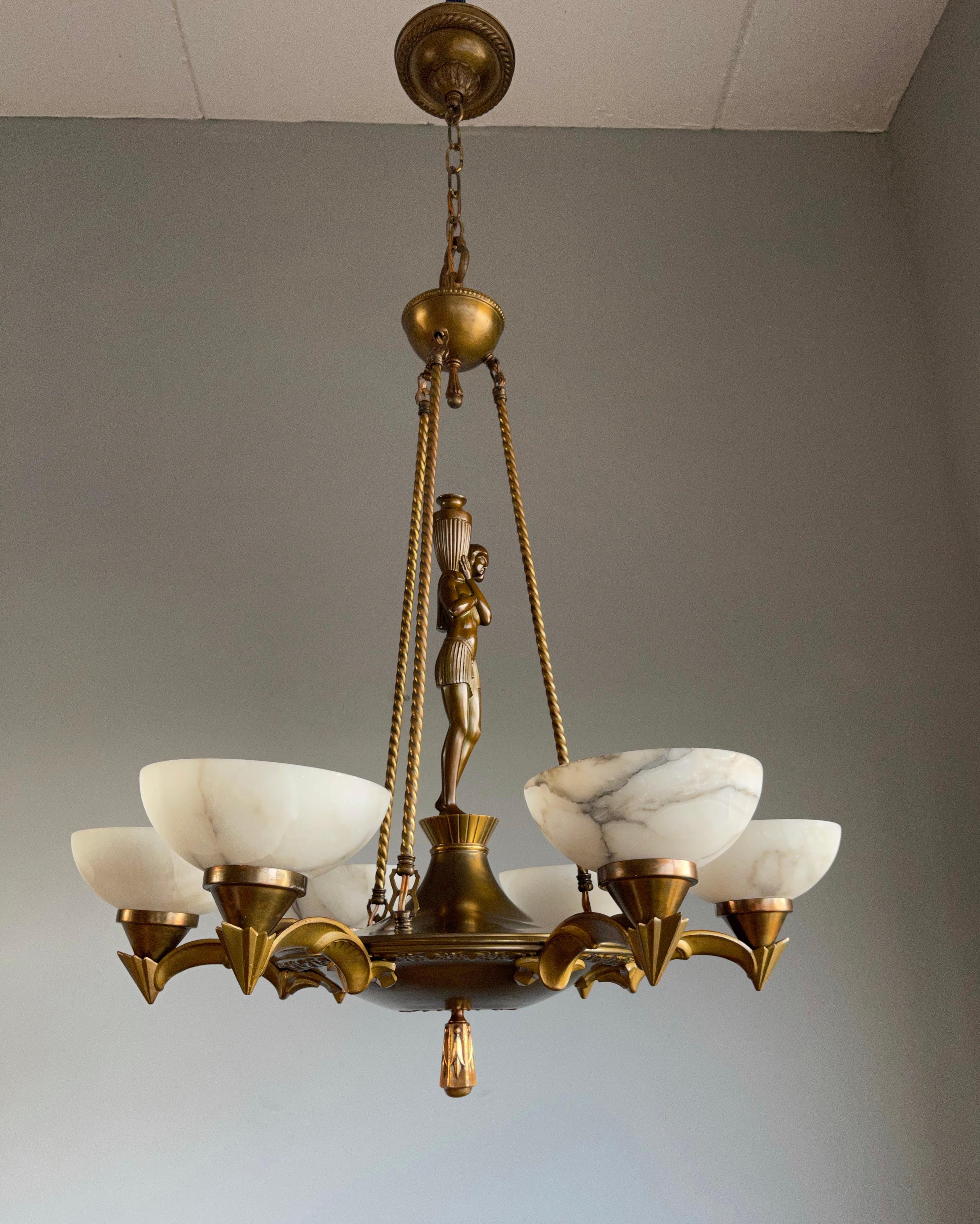 Beautiful Art Deco pendant light with a bronze sculpture (probably of Dione, goddess of water).

If you are looking for a truly stylish and top quality made antique light fixture to grace your dining room or kitchen then this handcrafted pendant