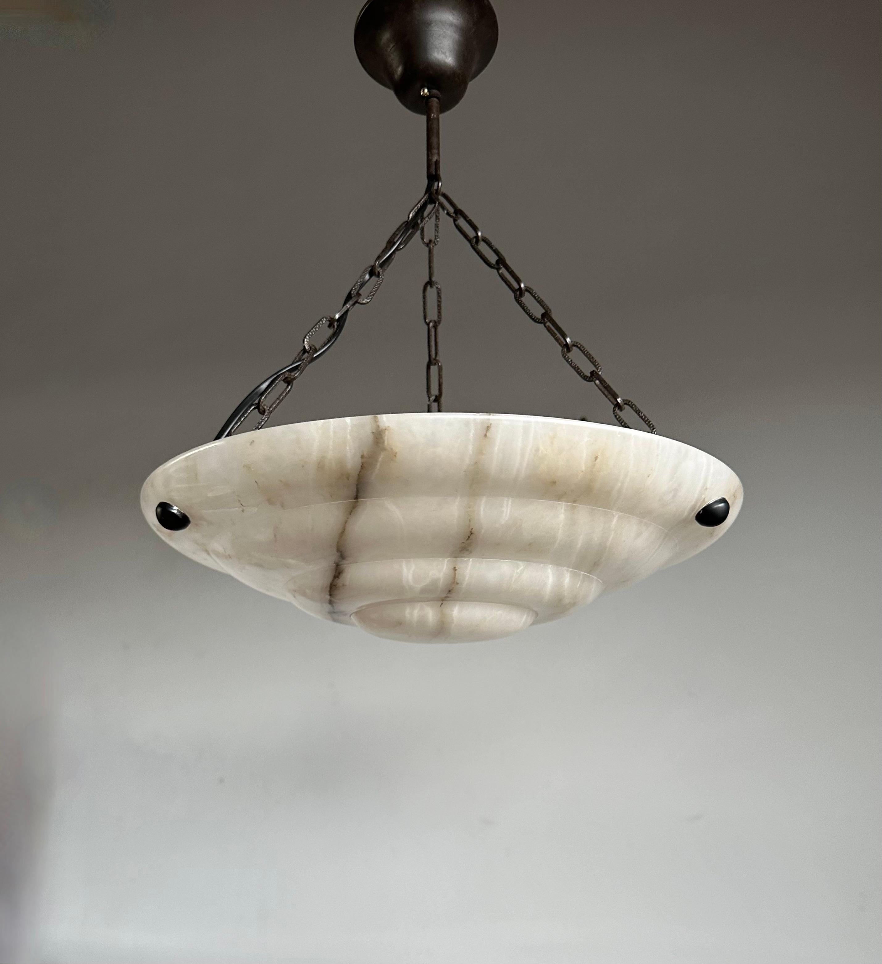 Superb condition pendant with a stunning and good size alabaster mineral stone shade.

Thanks to its good size and white color and remarkable design this alabaster chandelier will light up both your days and evenings. It is in excellent condition