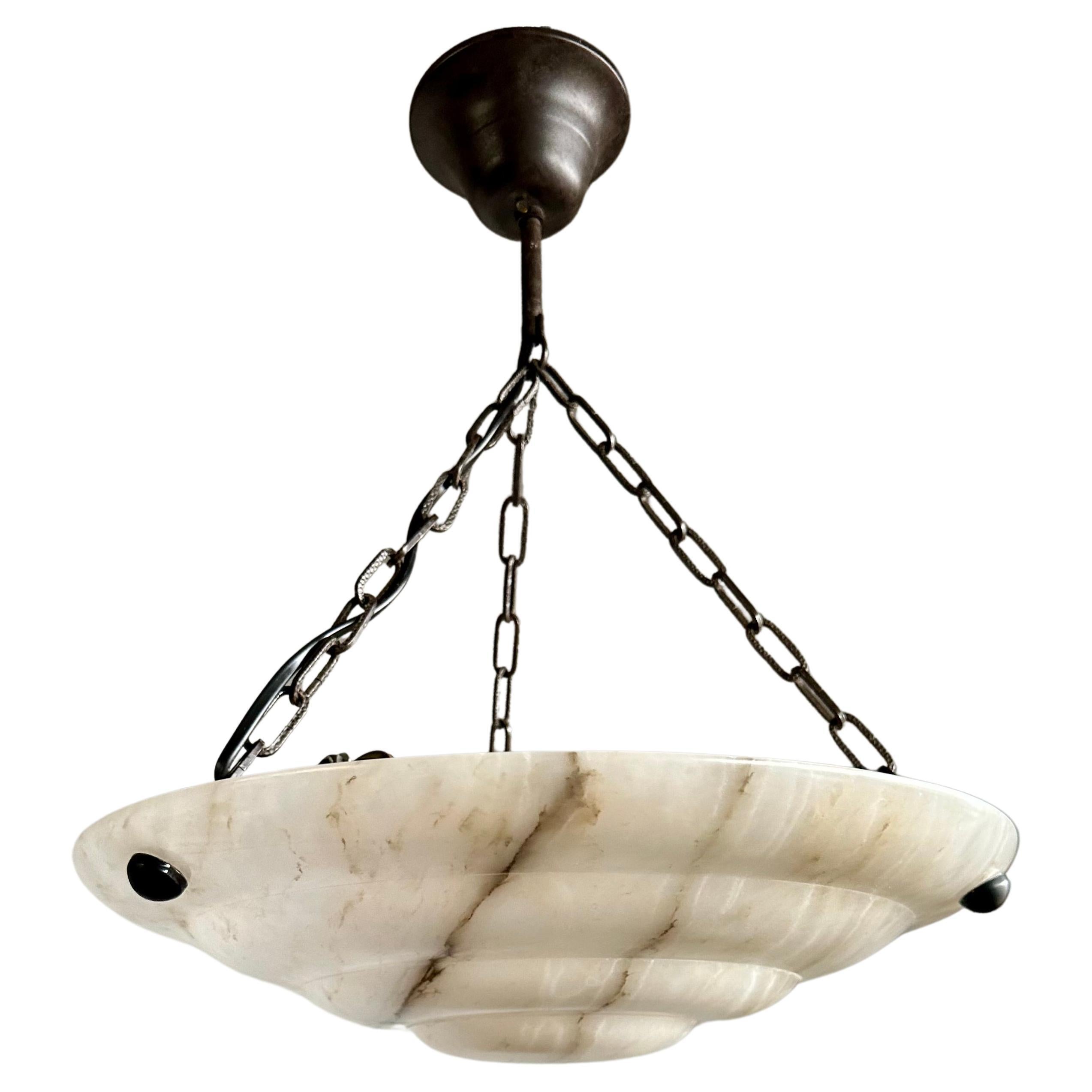 Pure Art Deco and Mint Condition White & Black Layered Alabaster Pendant Light For Sale