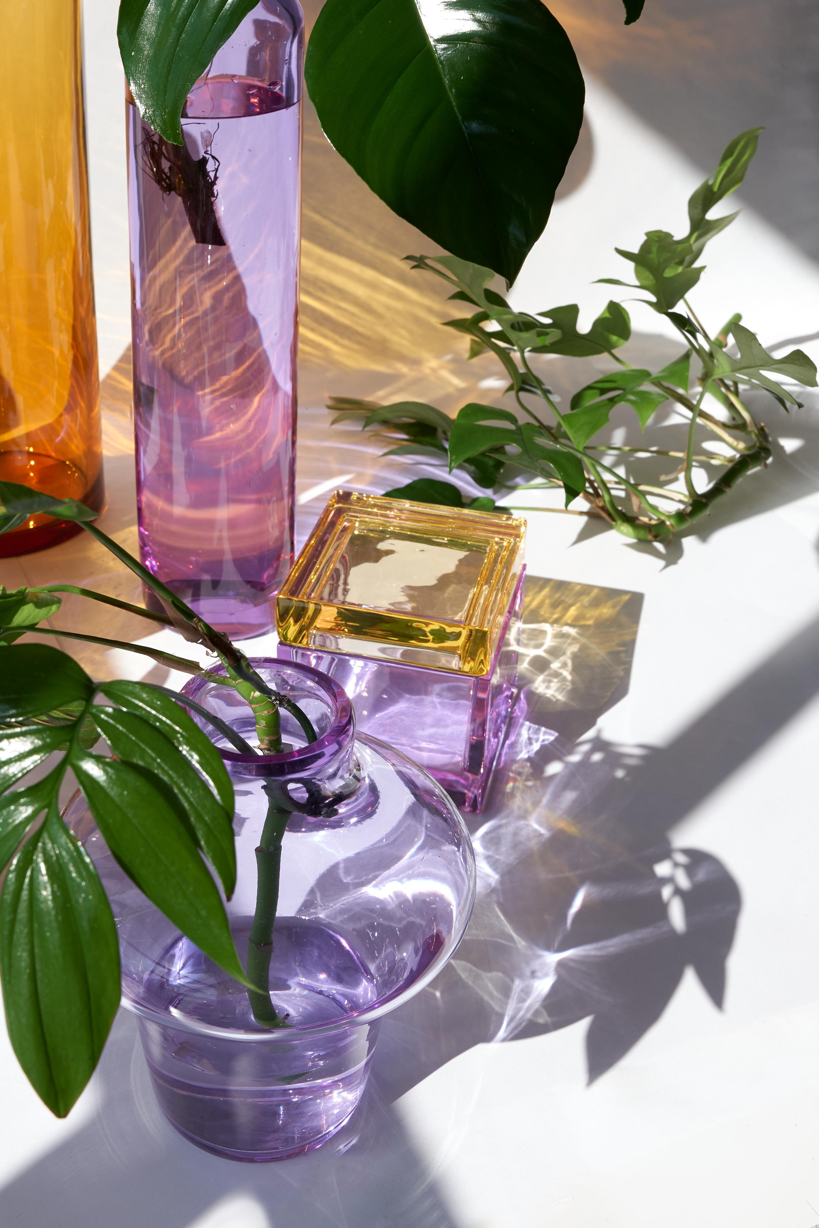 Pure Crystal Maratea Vase by Studio Bojola
Dimensions: D 17 x H 27 cm
Materials: Pure crystal. Colour: light violet. 
Weight: 2 kg. 

The Maratea is a combination of two vases, that can serving as both a sculptural crystal piece and a flower vase
