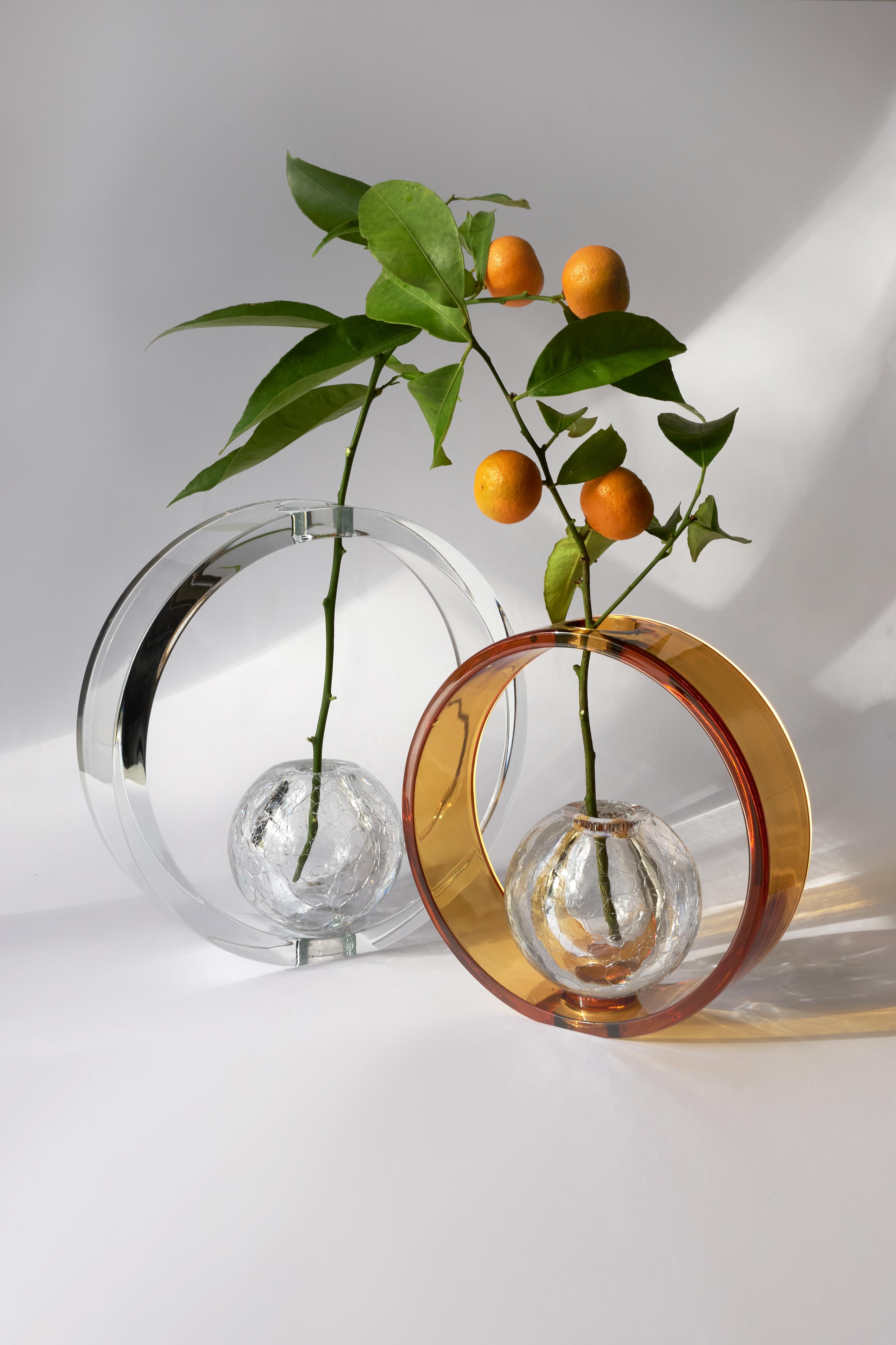 Pure Crystal Saturno & Saturnino Vase by Studio Bojola
Dimensions:  Saturno: D 25 x H 10 cm. Saturnino: D 20 x H 10 cm.
Materials: Pure crystal. 
Weight: 2.5 kg (saturno), 2 kg (saturnino)

The Saturnino is a combination of two pieces, the ring and